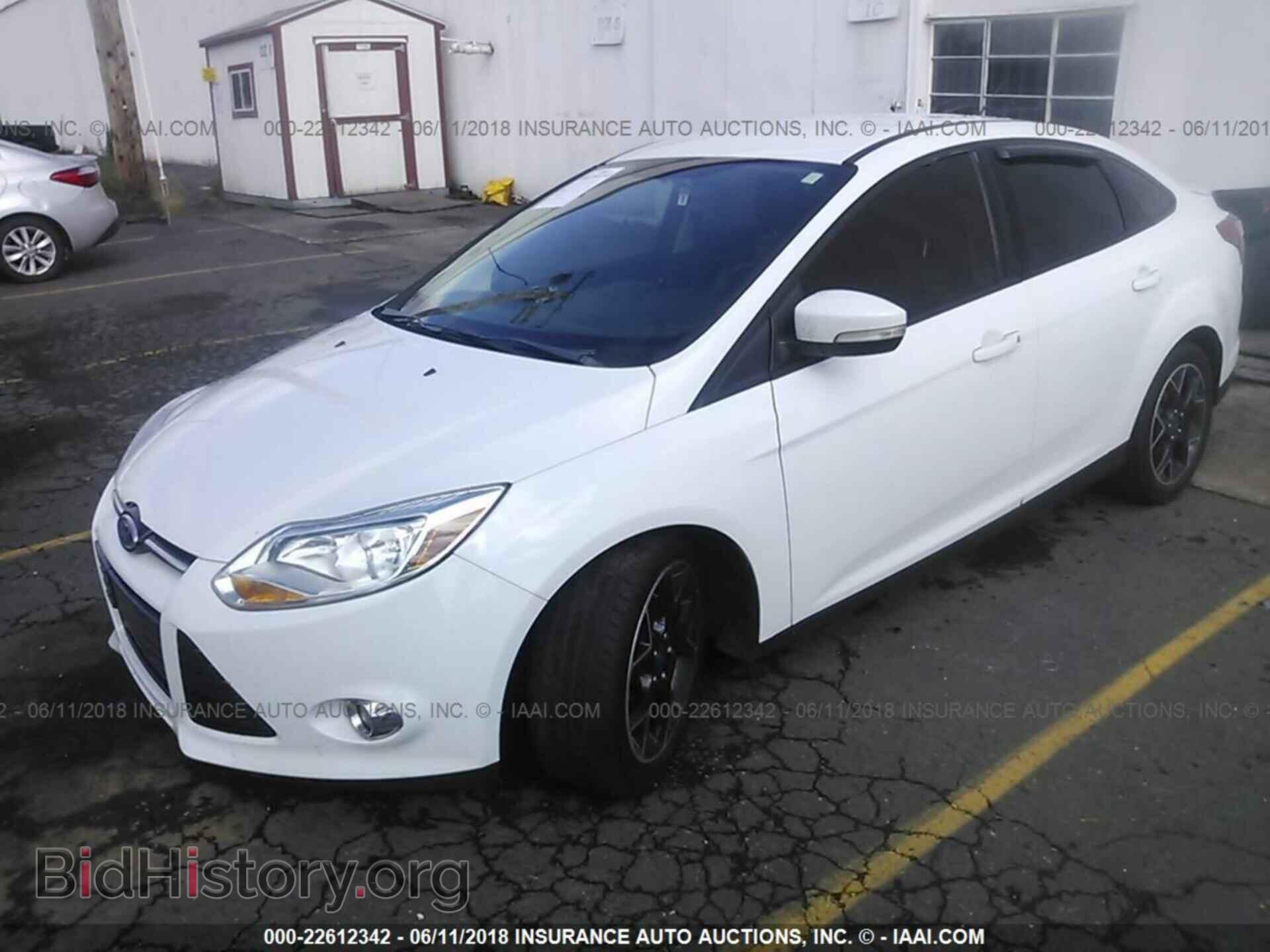 2012 Ford Focus - VIN: 1FAHP3F20CL216058 - Photo 2