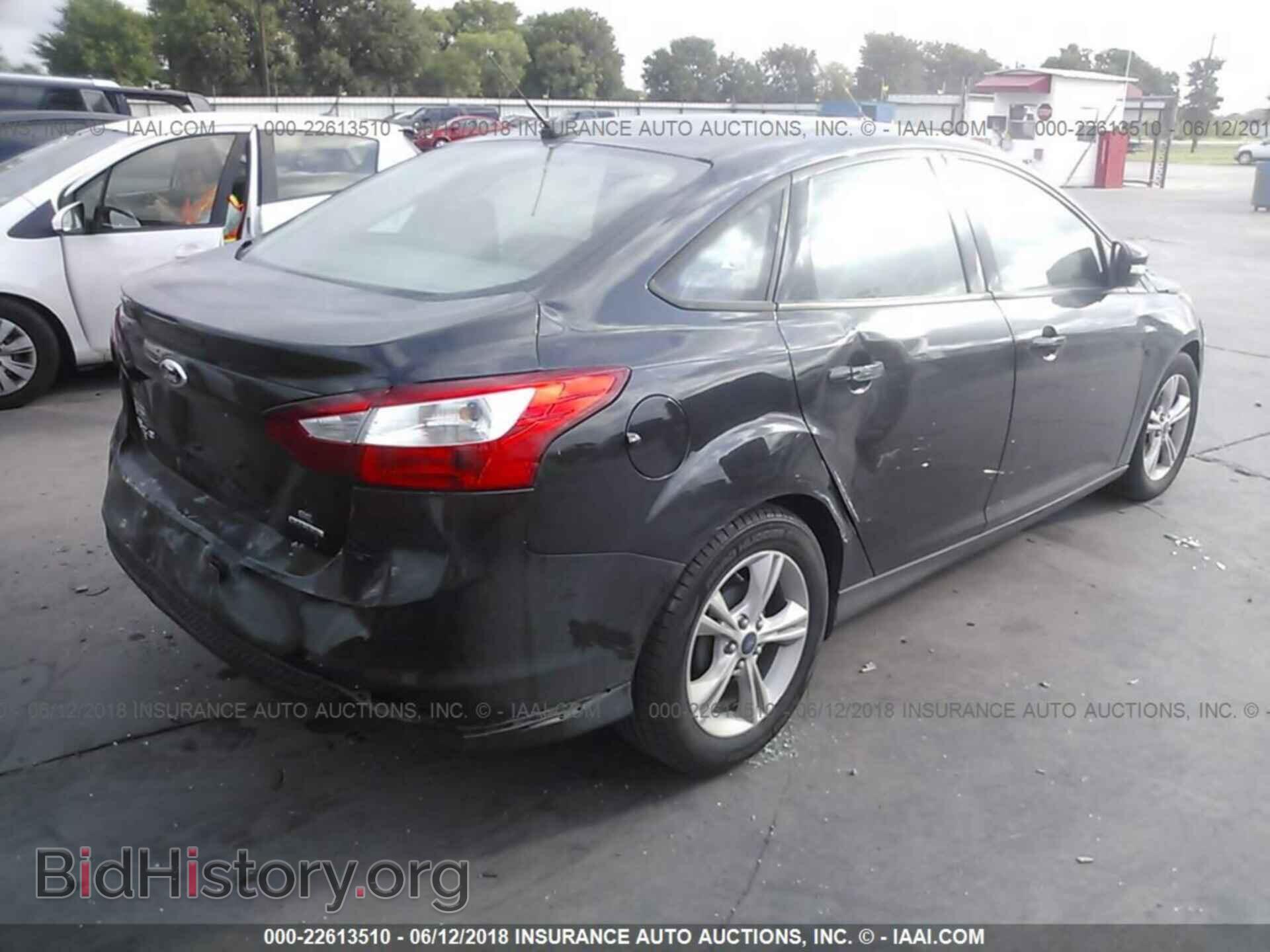 2014 Ford Focus - VIN: 1FADP3F20EL447673 - Photo 4