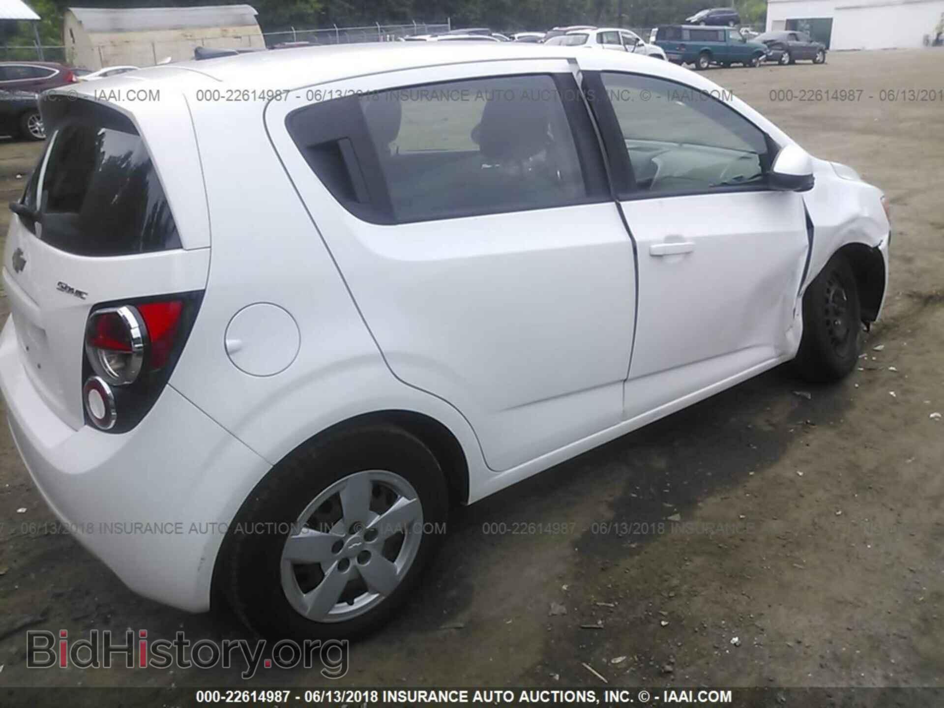 2014 Chevrolet Sonic - VIN: 1G1JA6SG4E4174385 - Фото 4