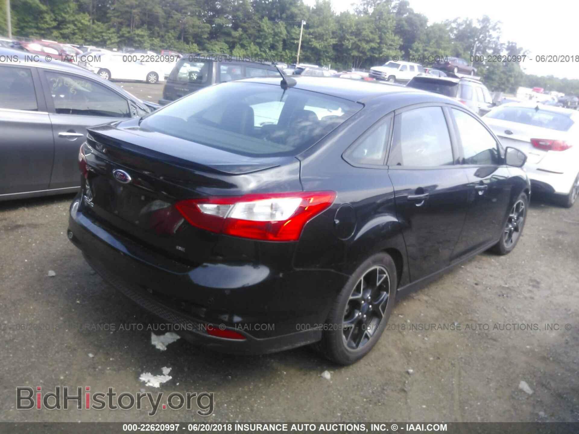 2014 Ford Focus - VIN: 1FADP3F20EL121131 - Photo 4