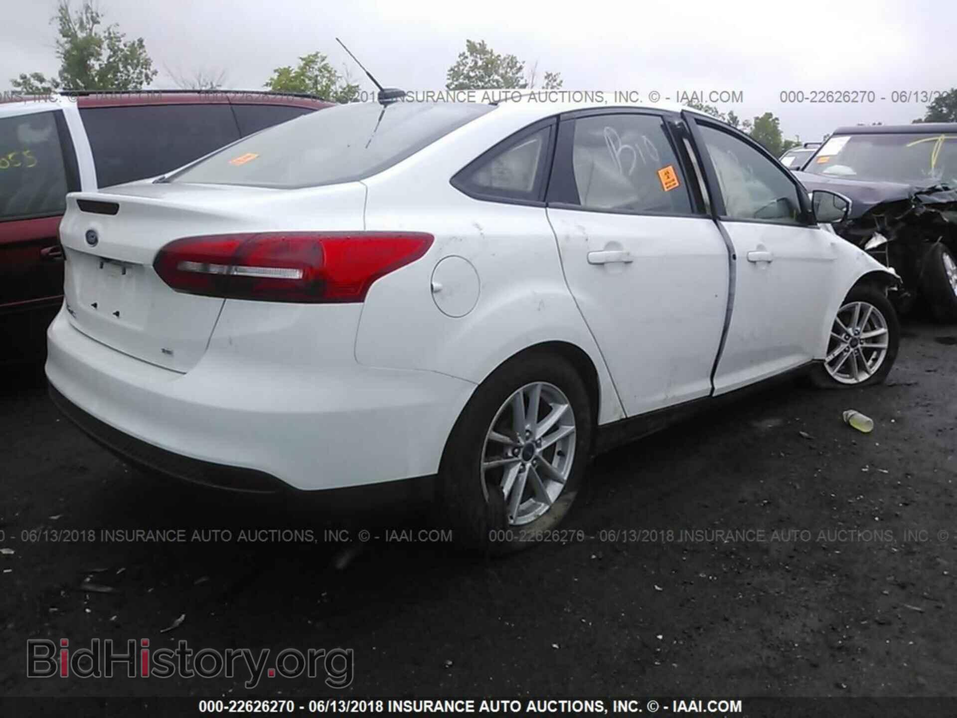 2017 Ford Focus - VIN: 1FADP3F24HL339884 - Photo 4
