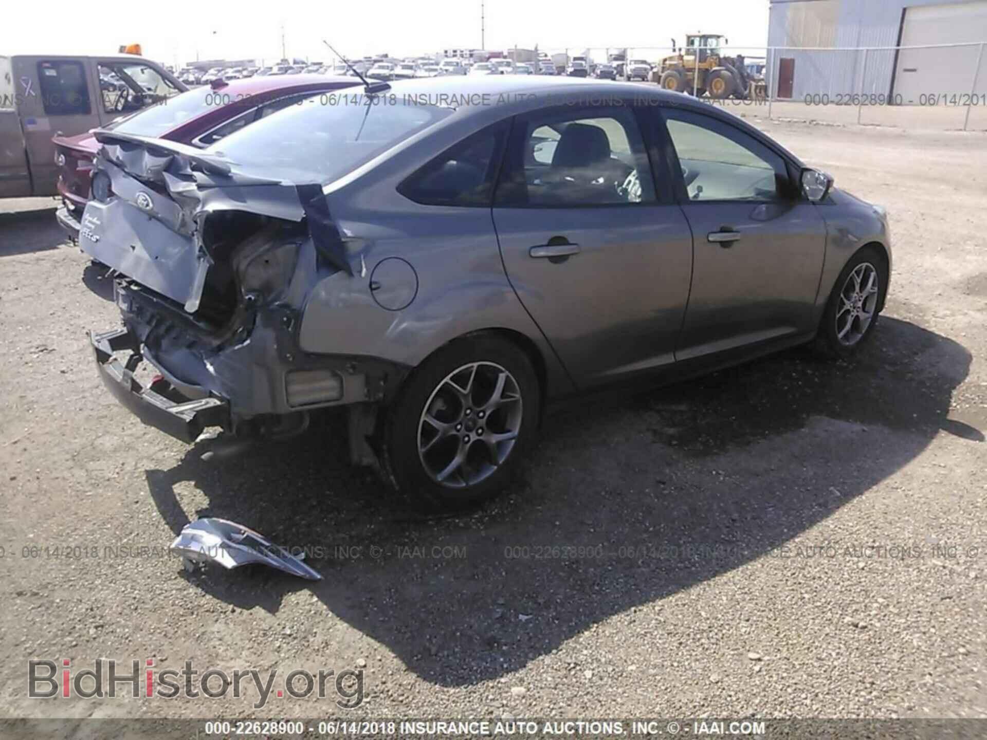 2014 Ford Focus - VIN: 1FADP3F20EL327792 - Фото 4