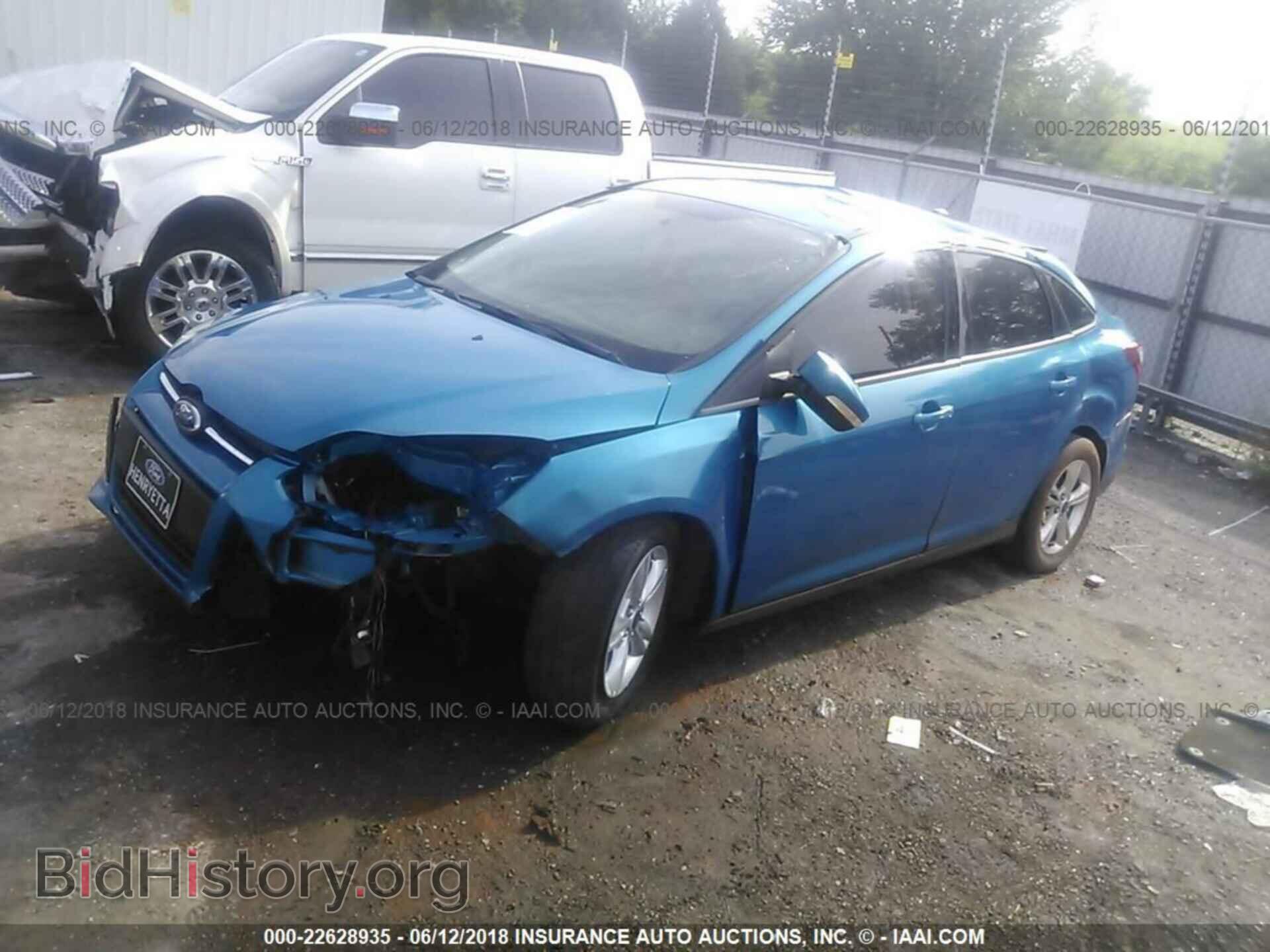 2014 Ford Focus - VIN: 1FADP3F26EL103166 - Фото 2