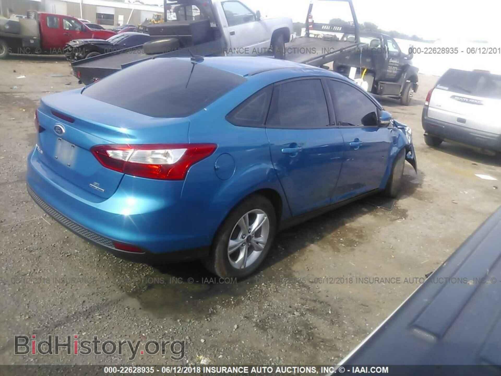 2014 Ford Focus - VIN: 1FADP3F26EL103166 - Фото 4