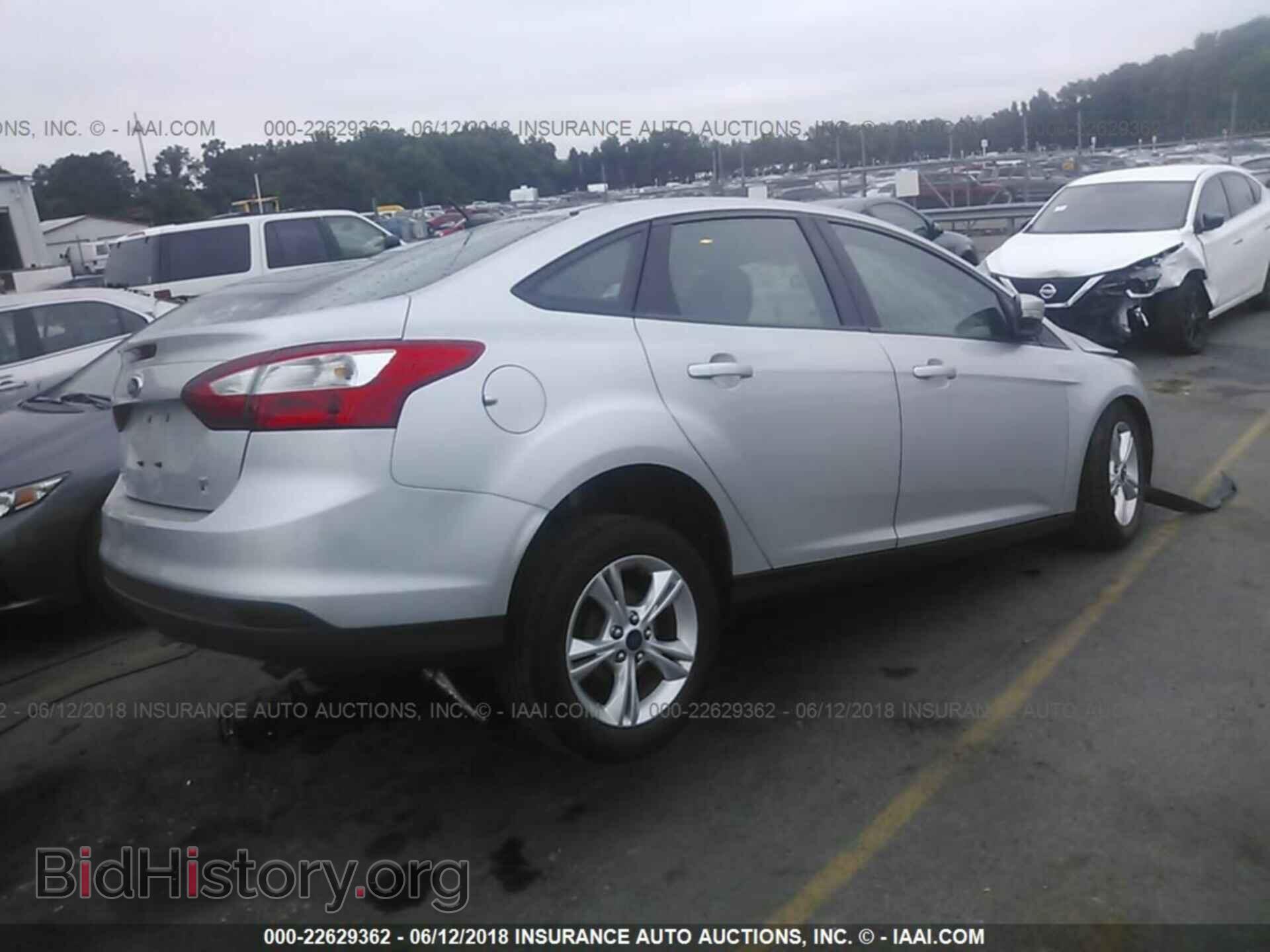 2014 Ford Focus - VIN: 1FADP3F27EL395166 - Фото 4