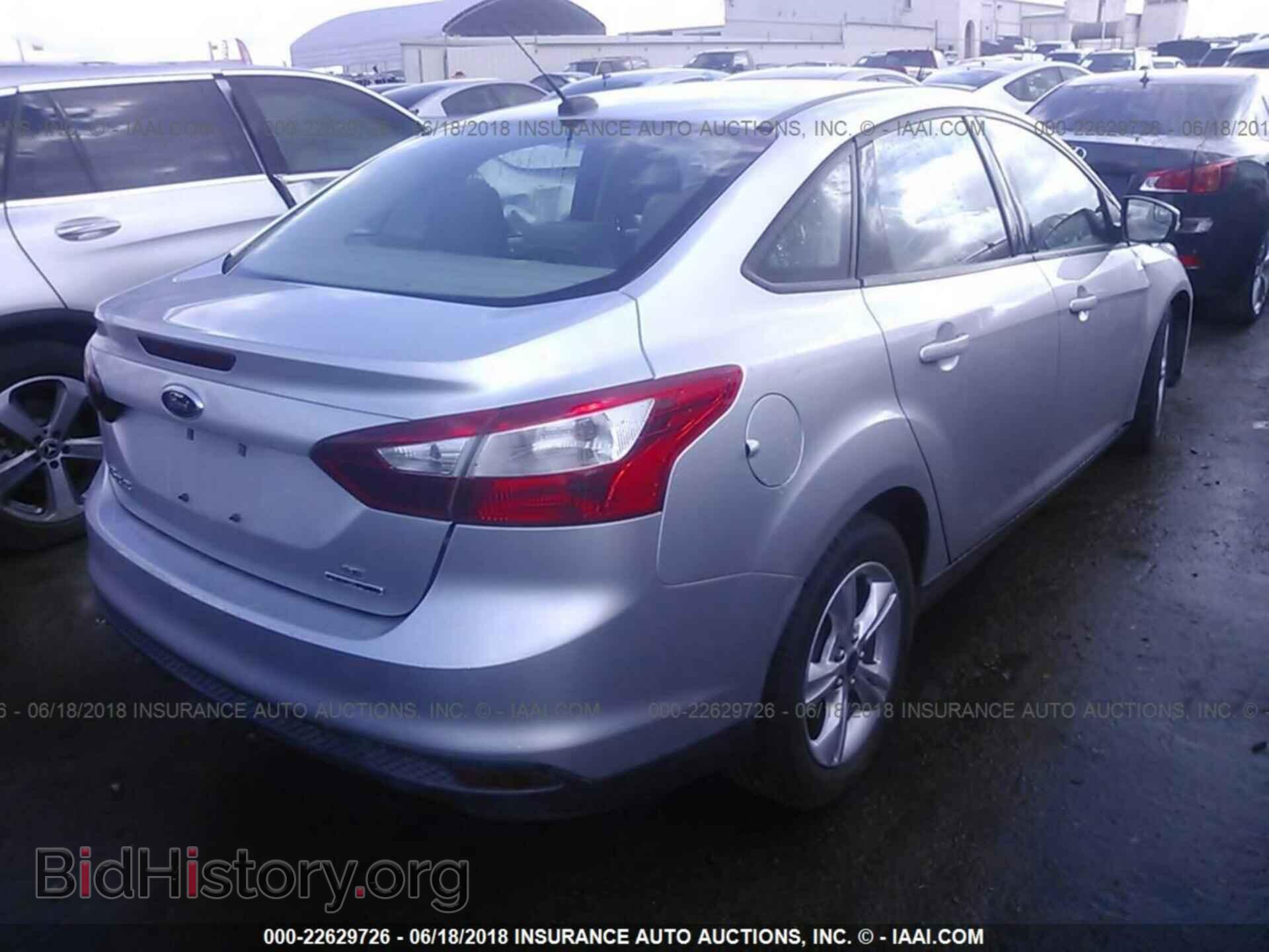 2013 Ford Focus - VIN: 1FADP3F25DL352427 - Photo 4