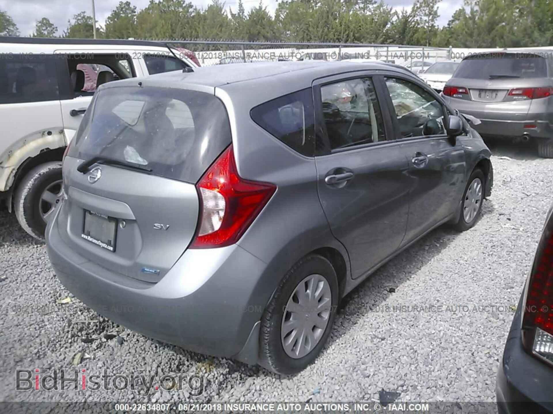 2014 Nissan Versa note - VIN: 3N1CE2CP3EL409495 - Фото 4