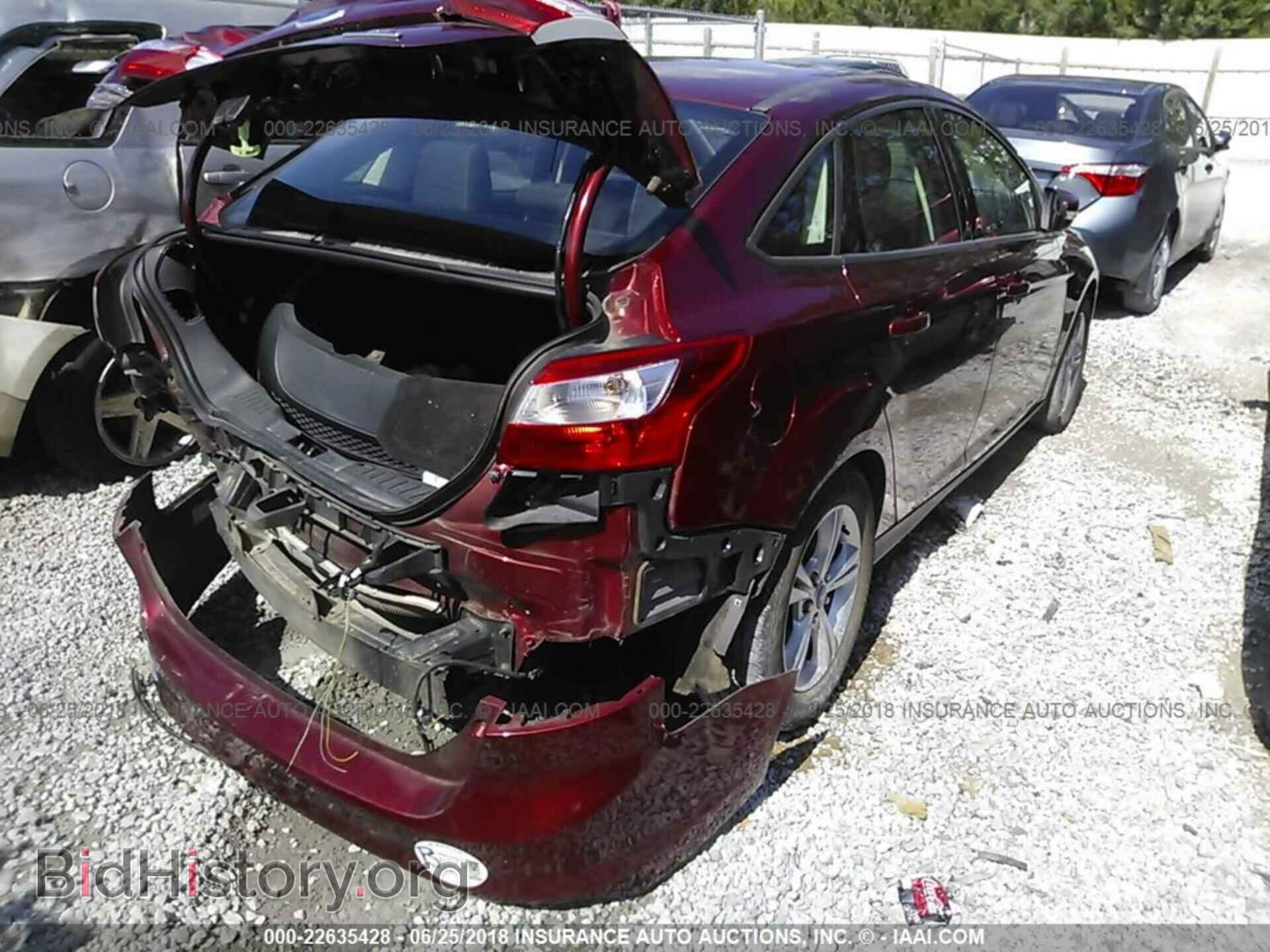 2014 Ford Focus - VIN: 1FADP3F26EL138533 - Photo 4