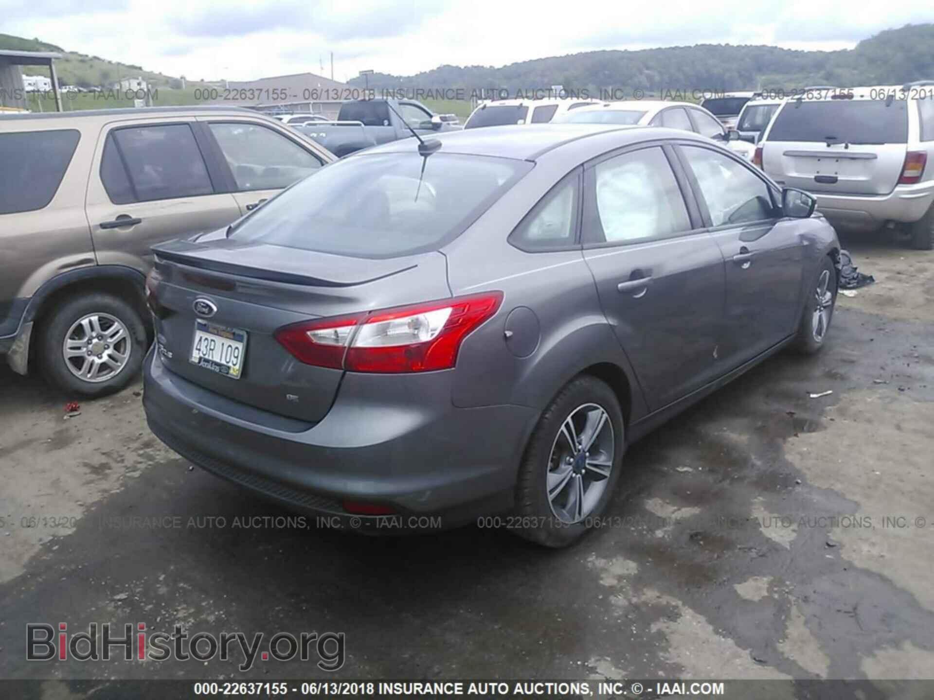 2014 Ford Focus - VIN: 1FADP3F25EL448771 - Photo 4