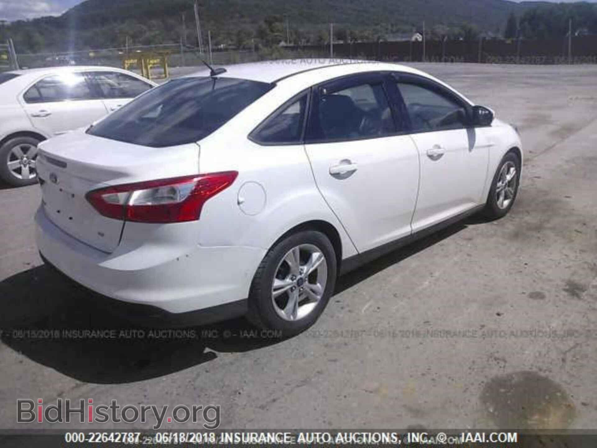 2014 Ford Focus - VIN: 1FADP3F24EL193563 - Фото 4