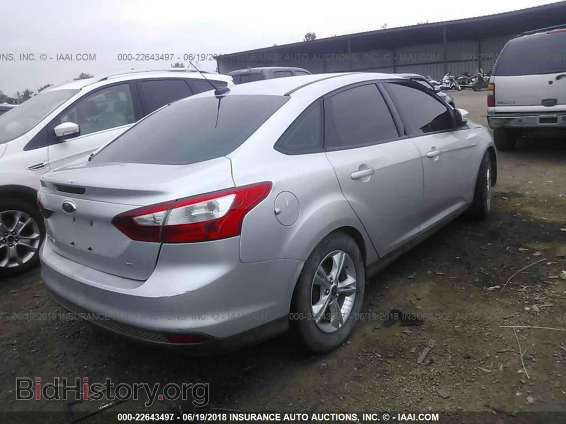 2014 Ford Focus - VIN: 1FADP3F21EL124586 - Photo 4