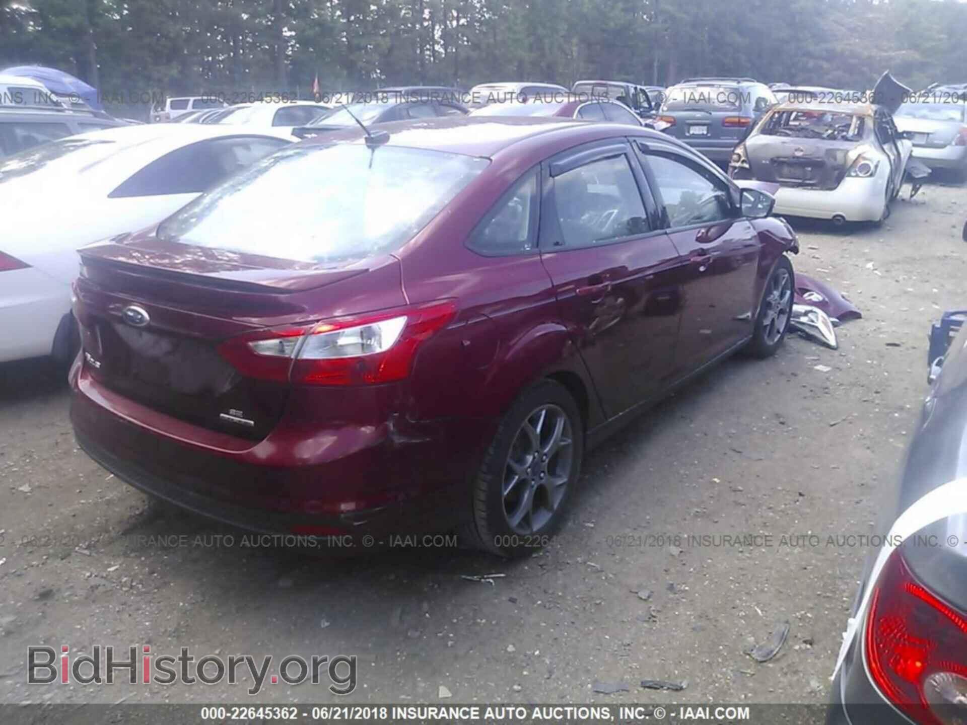 2014 Ford Focus - VIN: 1FADP3F21EL338767 - Photo 4
