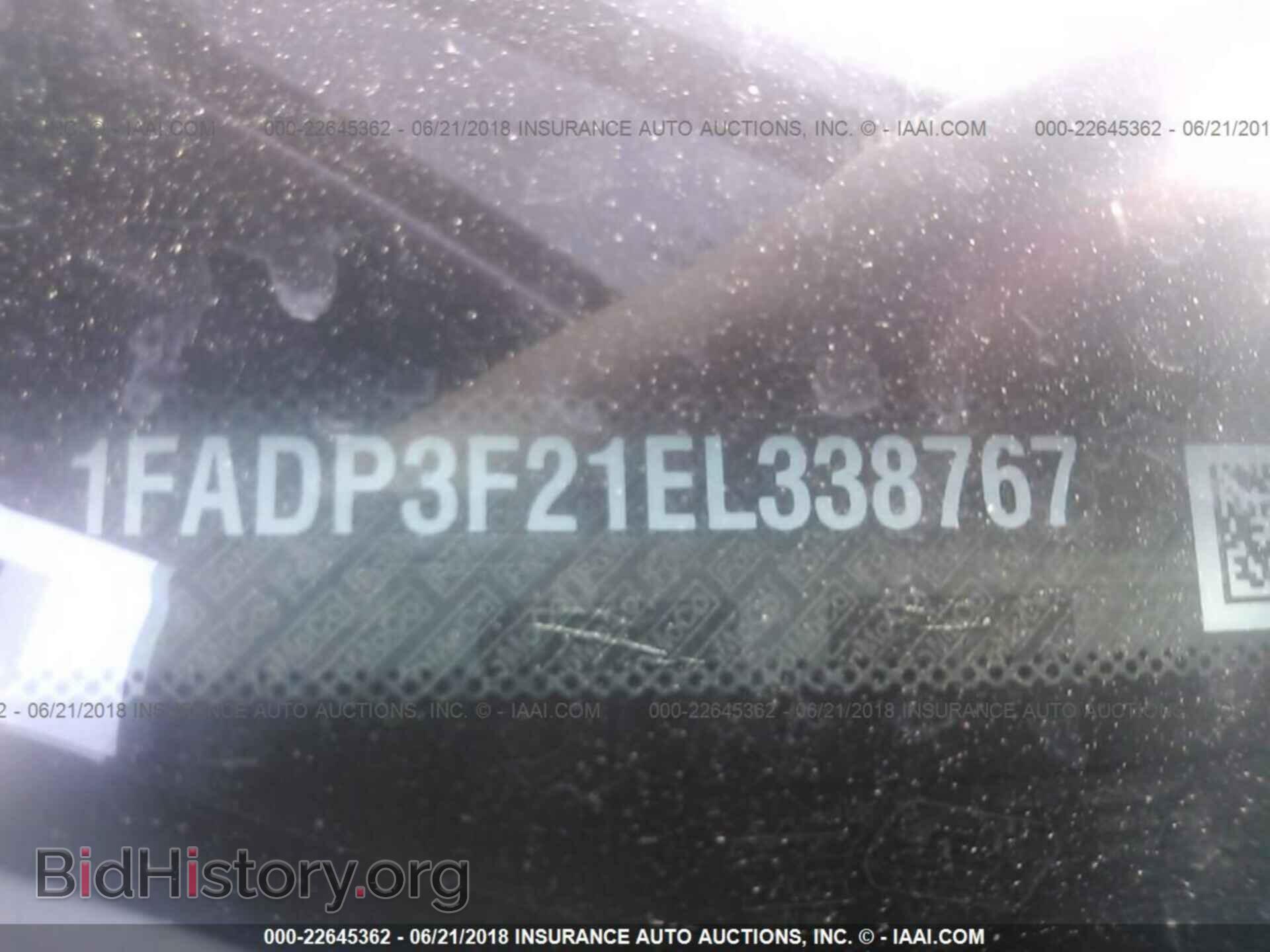 2014 Ford Focus - VIN: 1FADP3F21EL338767 - Photo 9