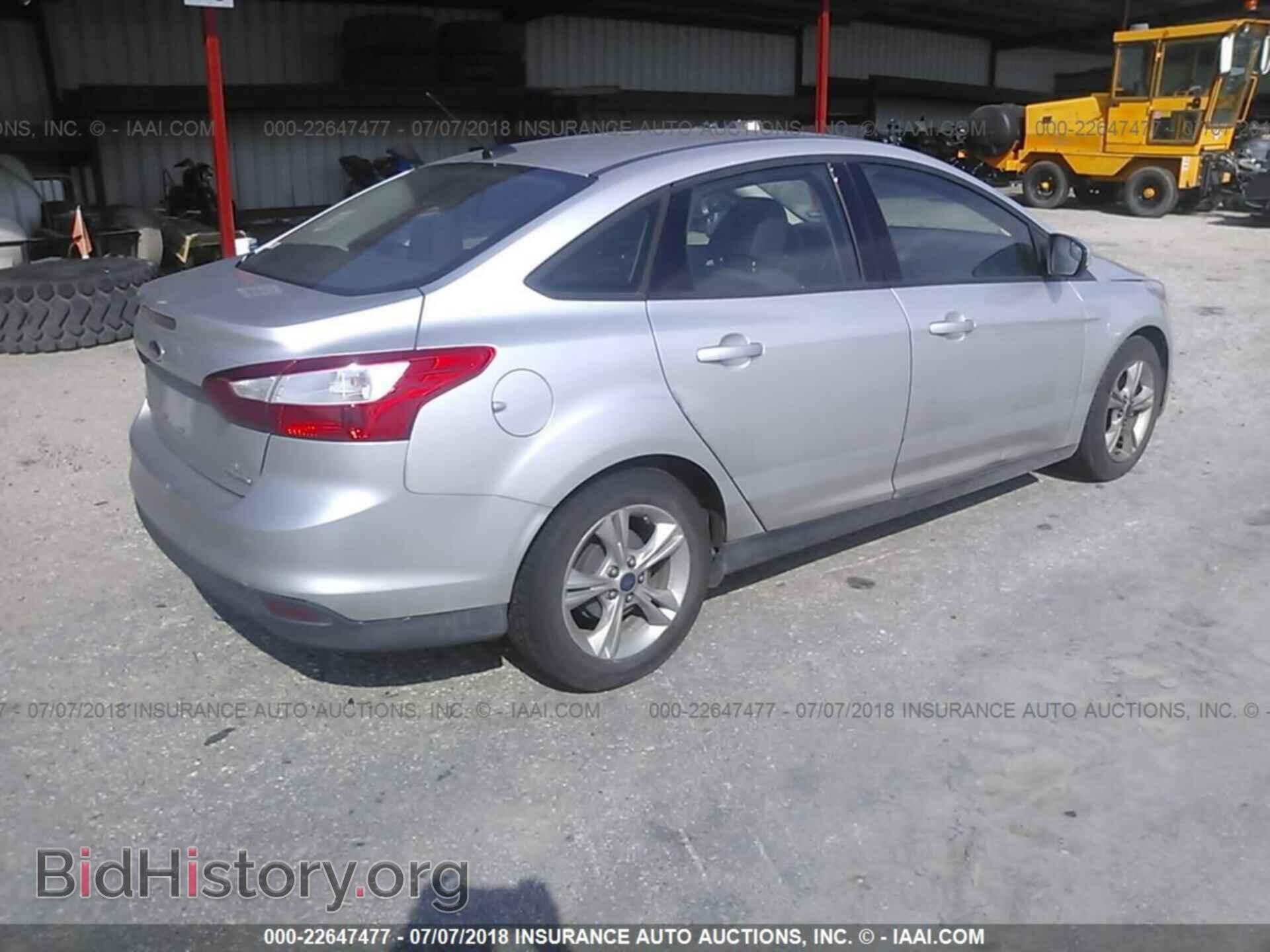 2014 Ford Focus - VIN: 1FADP3F23EL284727 - Photo 4