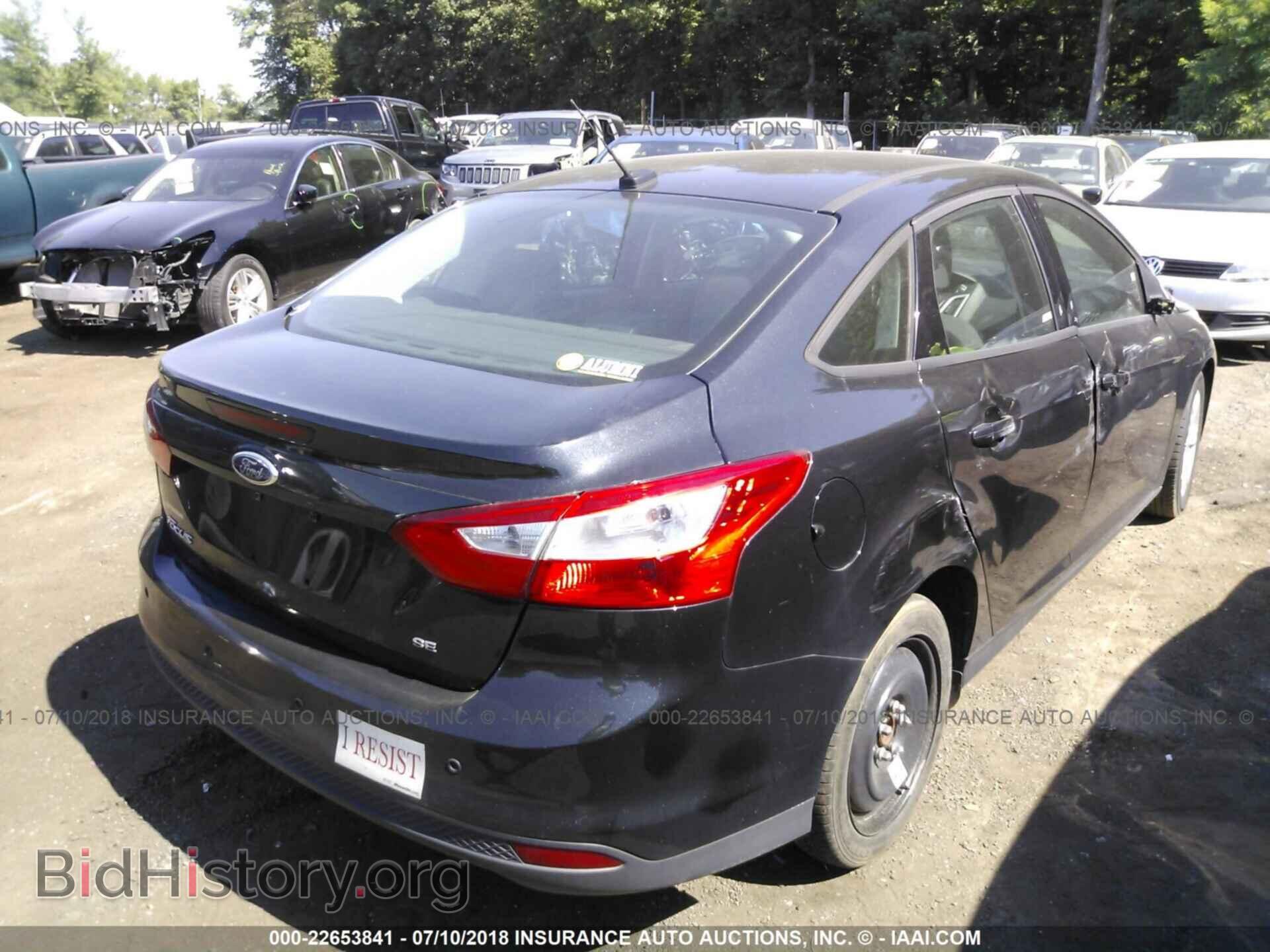 2013 Ford Focus - VIN: 1FADP3F28DL217779 - Photo 4