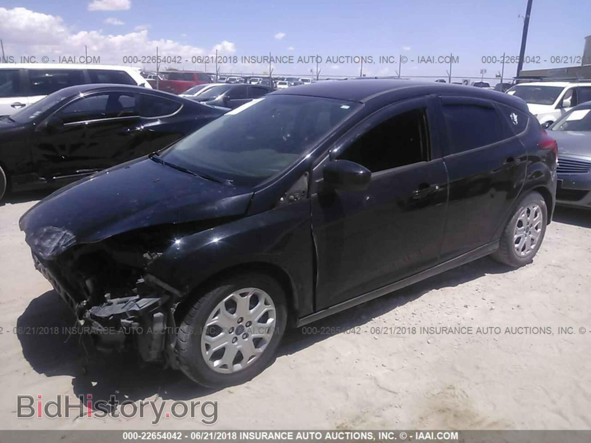 2012 Ford Focus - VIN: 1FAHP3K24CL268704 - Photo 2