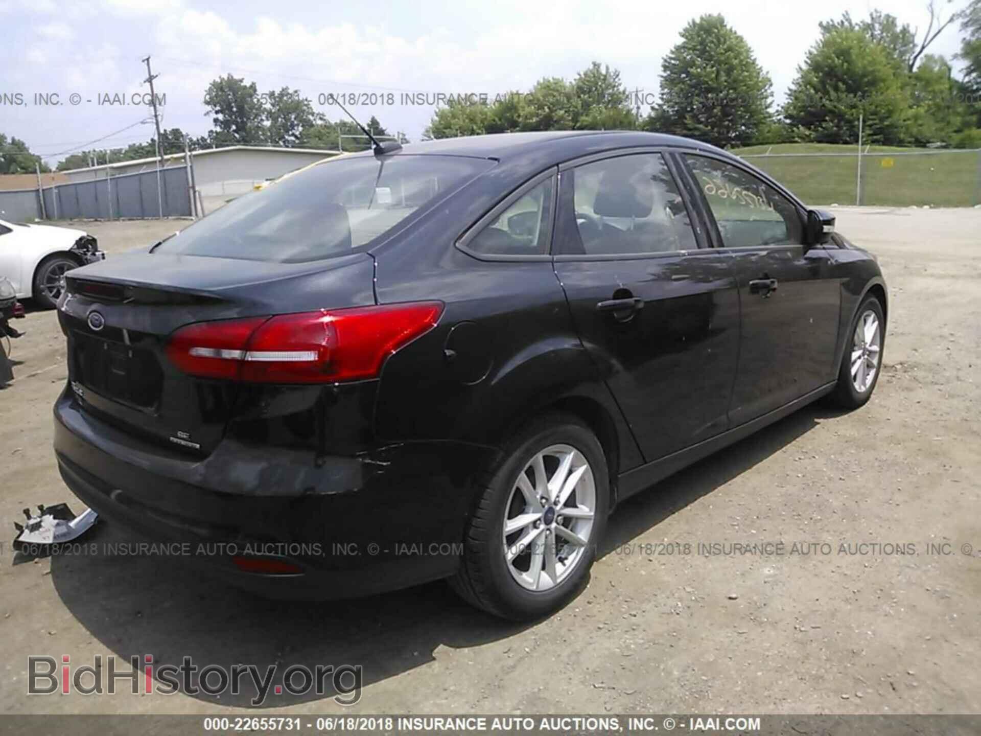 2015 Ford Focus - VIN: 1FADP3F27FL325491 - Photo 4
