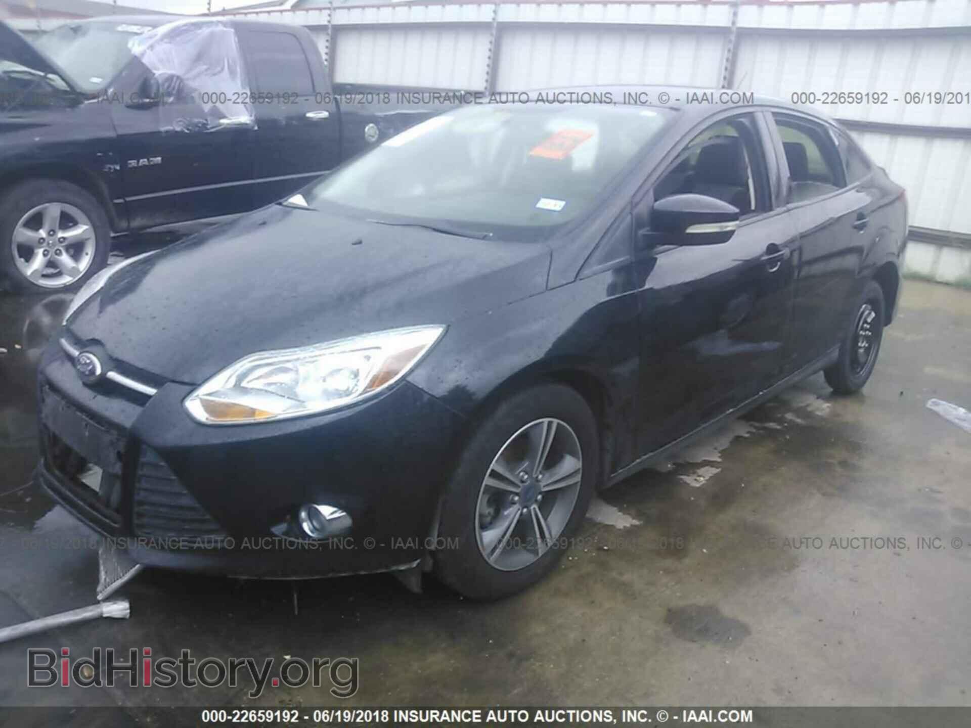 2014 Ford Focus - VIN: 1FADP3F20EL440142 - Photo 2