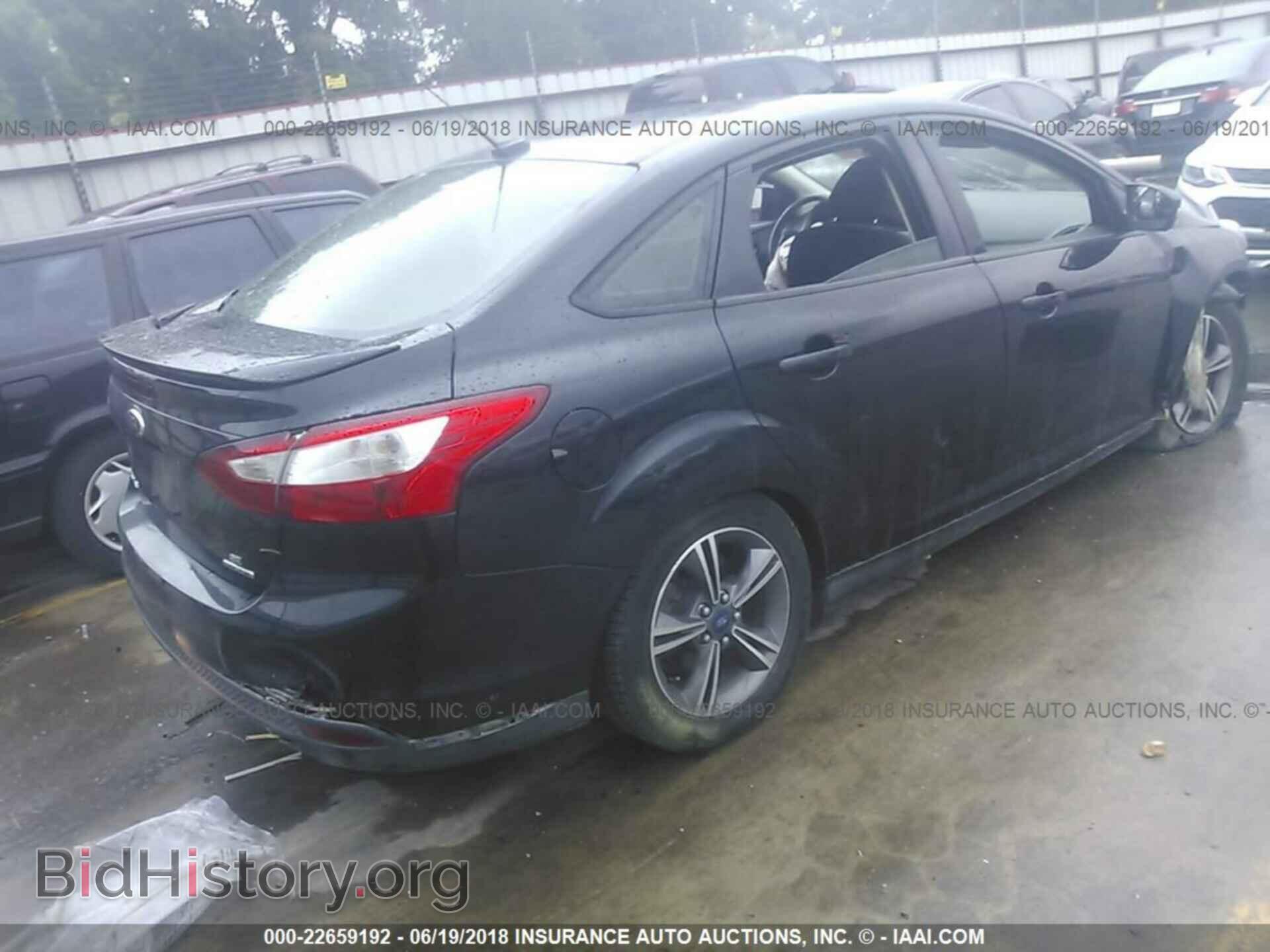 2014 Ford Focus - VIN: 1FADP3F20EL440142 - Photo 4