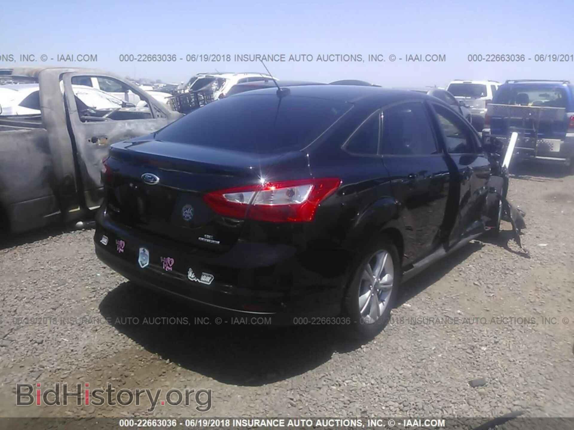 2014 Ford Focus - VIN: 1FADP3F28EL442396 - Photo 4