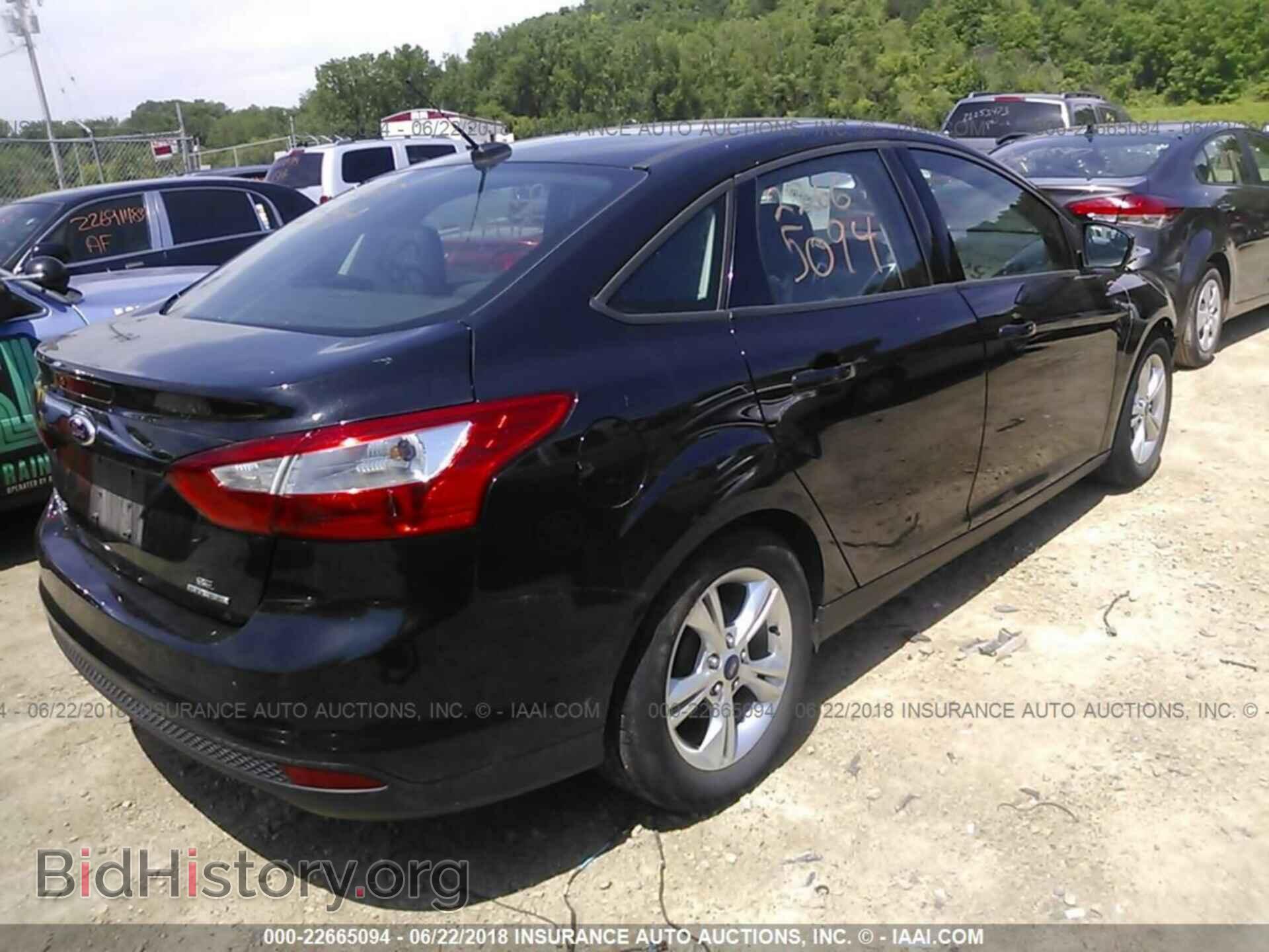 2014 Ford Focus - VIN: 1FADP3F27EL118257 - Photo 4