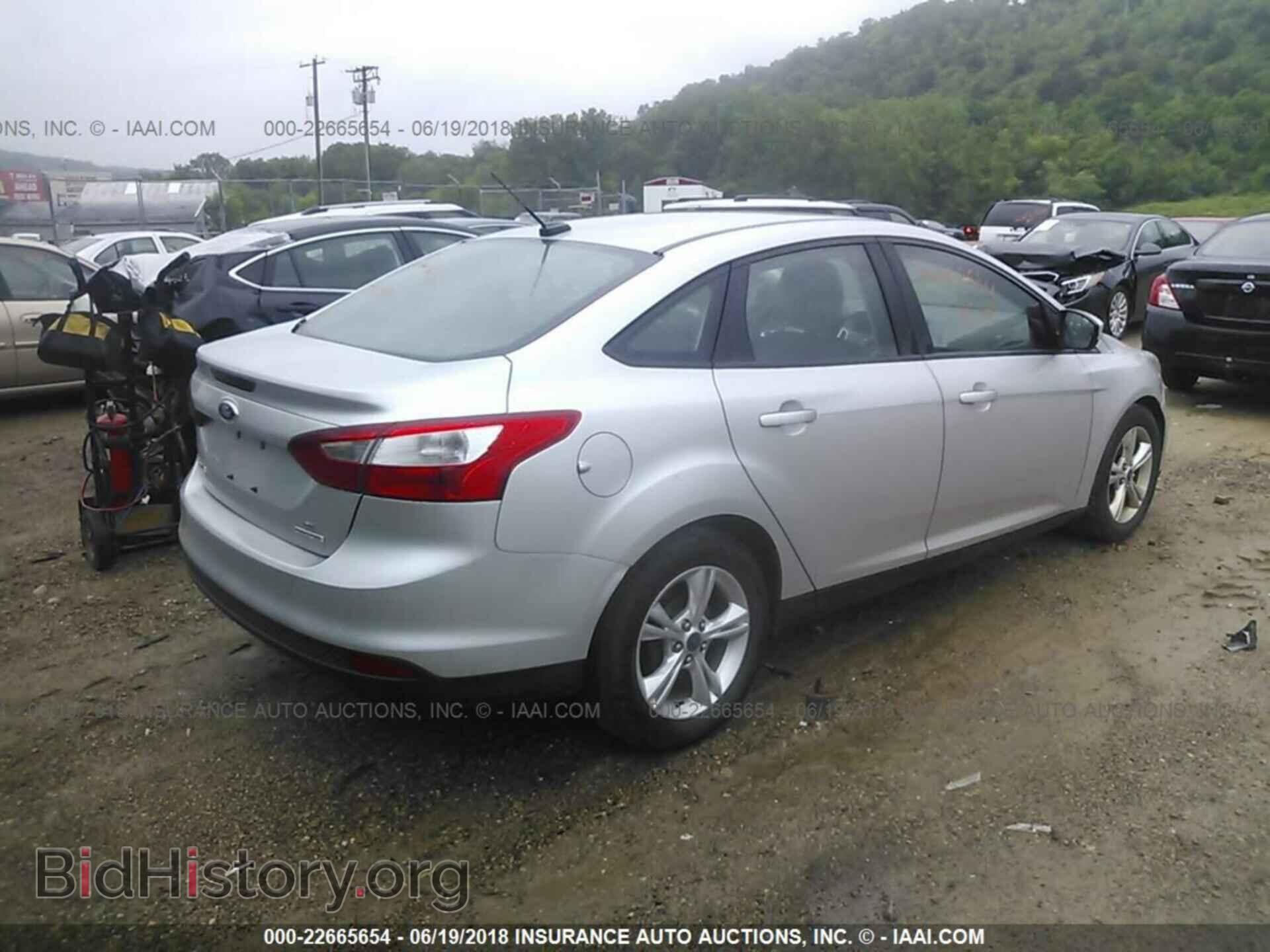 2013 Ford Focus - VIN: 1FADP3F24DL244669 - Photo 4
