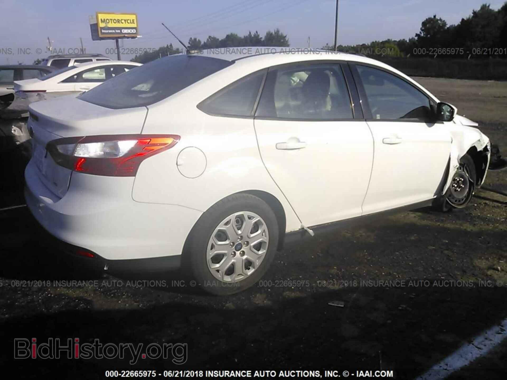 2012 Ford Focus - VIN: 1FAHP3F29CL341849 - Фото 4