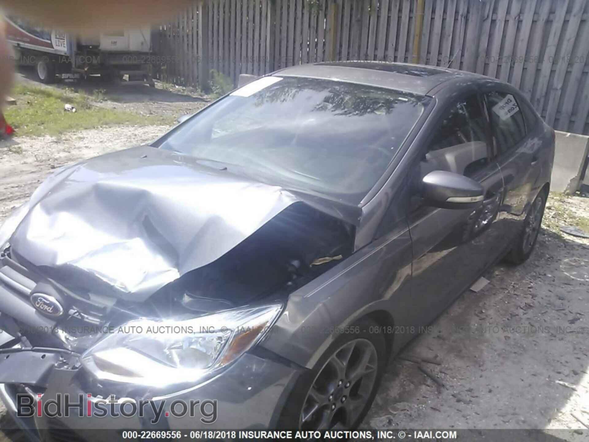 2014 Ford Focus - VIN: 1FADP3F27EL447816 - Фото 2