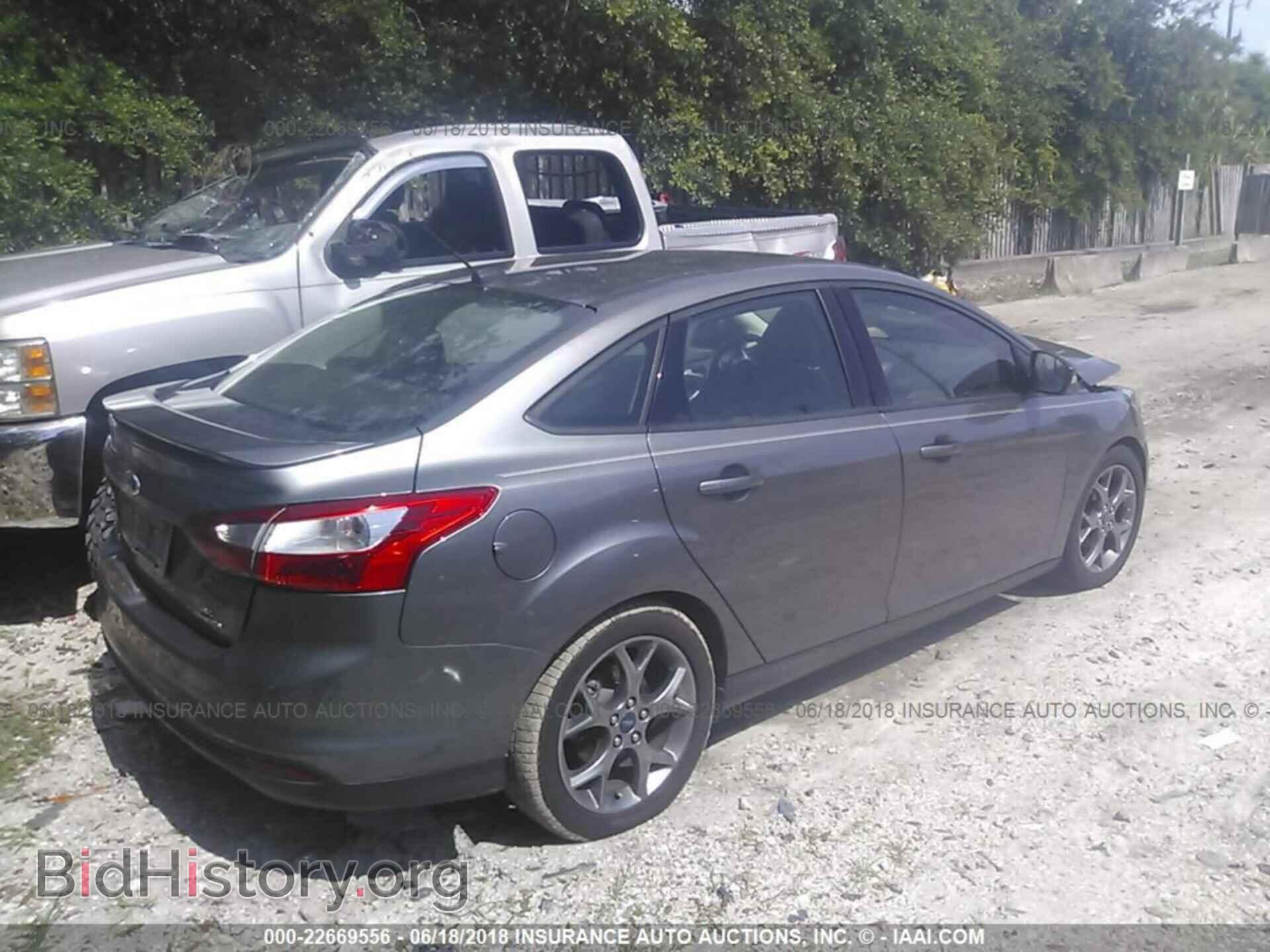 2014 Ford Focus - VIN: 1FADP3F27EL447816 - Фото 4