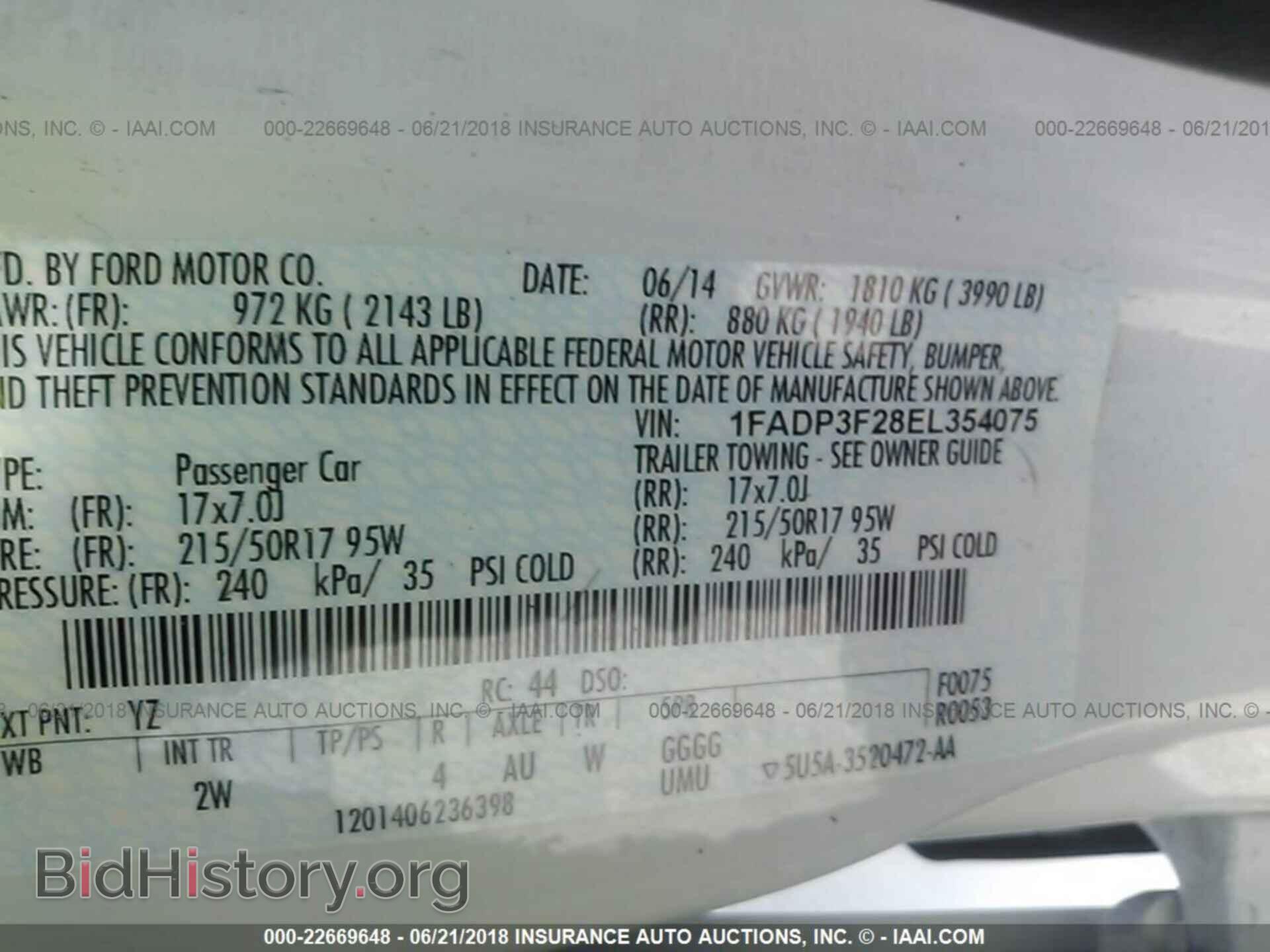 2014 Ford Focus - VIN: 1FADP3F28EL354075 - Фото 9