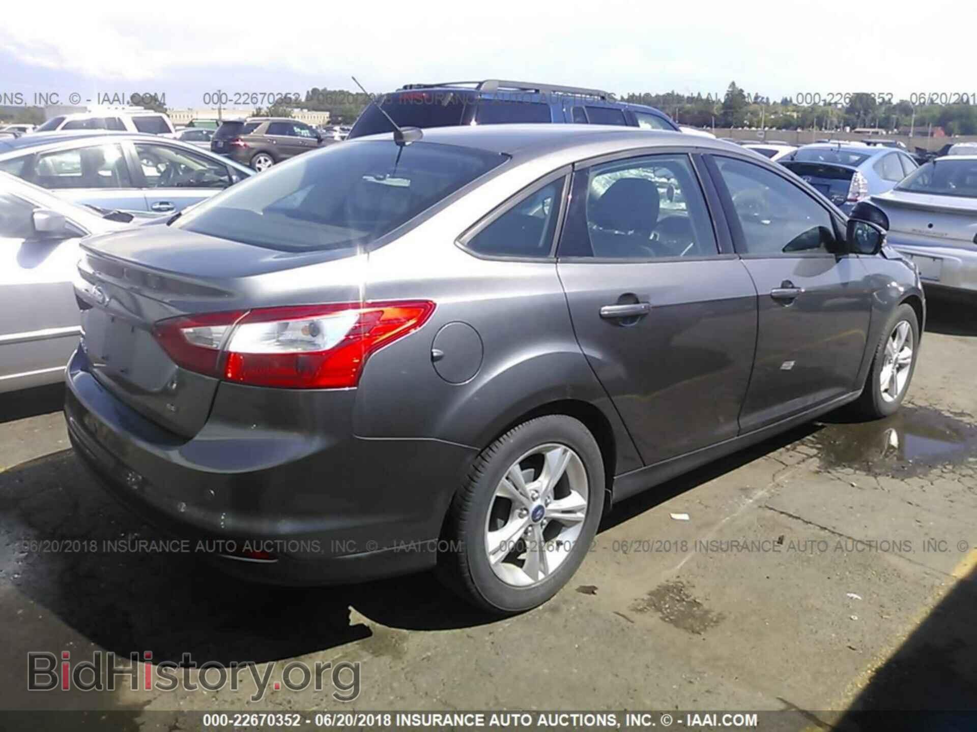 2014 Ford Focus - VIN: 1FADP3F23EL375755 - Photo 4
