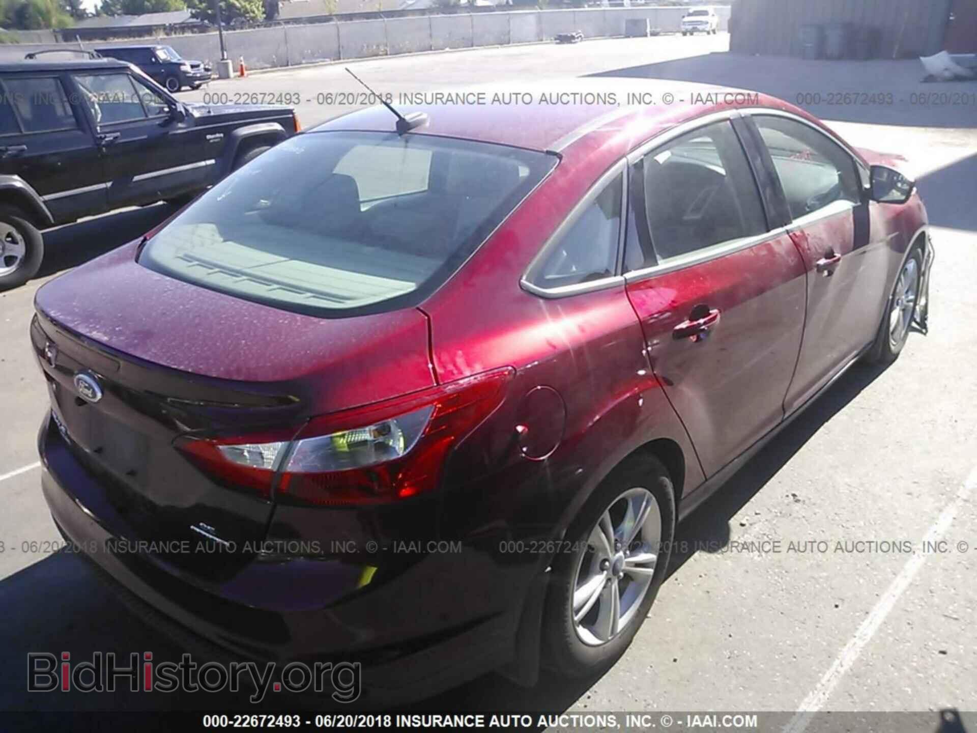 2014 Ford Focus - VIN: 1FADP3F20EL131271 - Фото 4