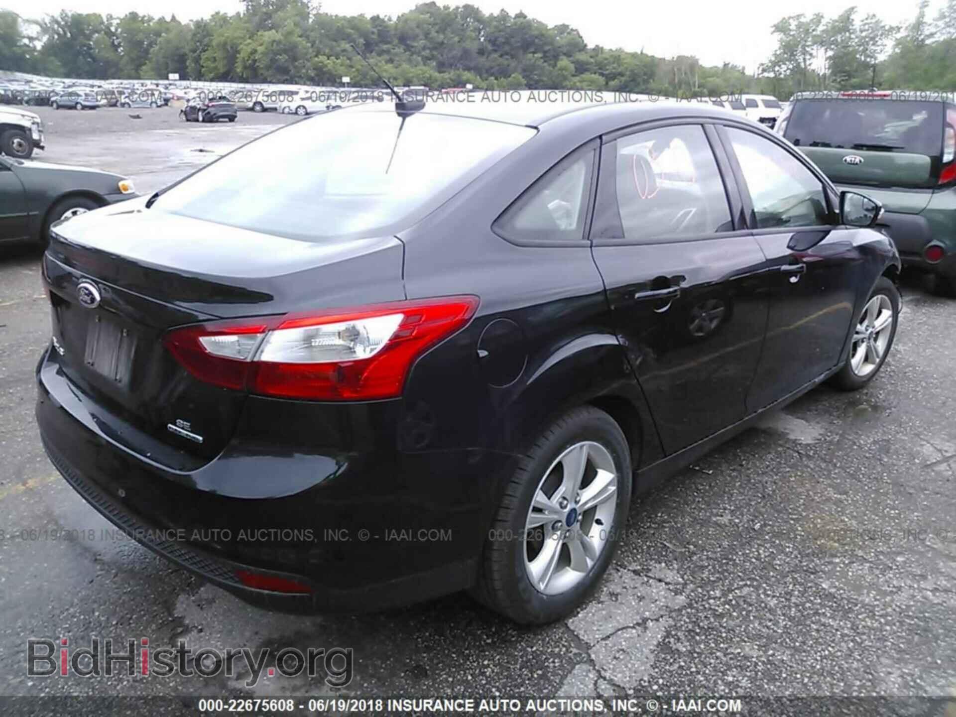 2013 Ford Focus - VIN: 1FADP3F24DL219898 - Photo 4