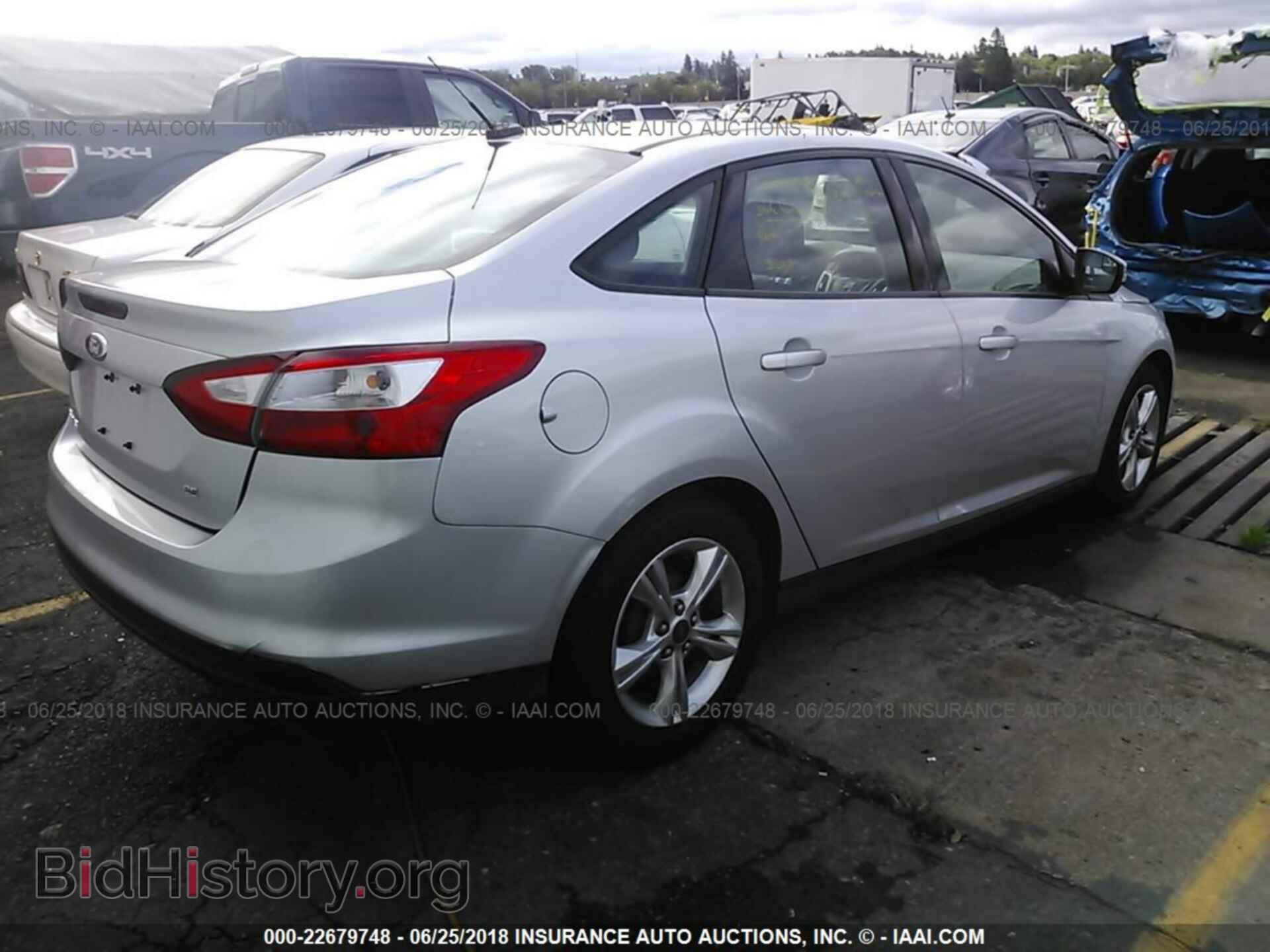 2014 Ford Focus - VIN: 1FADP3F28EL312358 - Фото 4