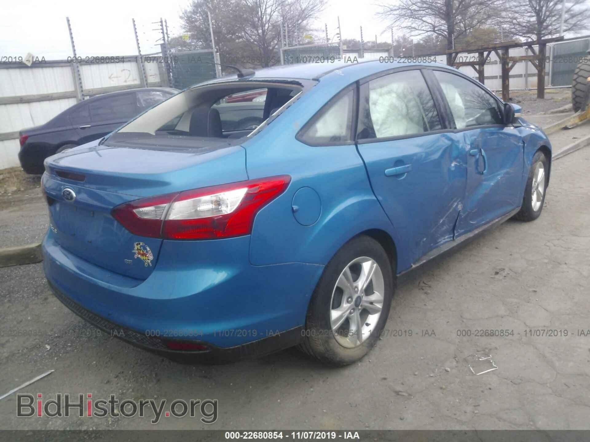 2014 Ford Focus - VIN: 1FADP3F29EL153527 - Photo 4