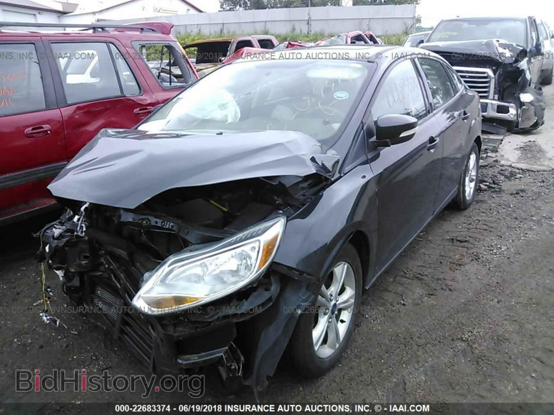 2014 Ford Focus - VIN: 1FADP3F22EL301632 - Photo 2