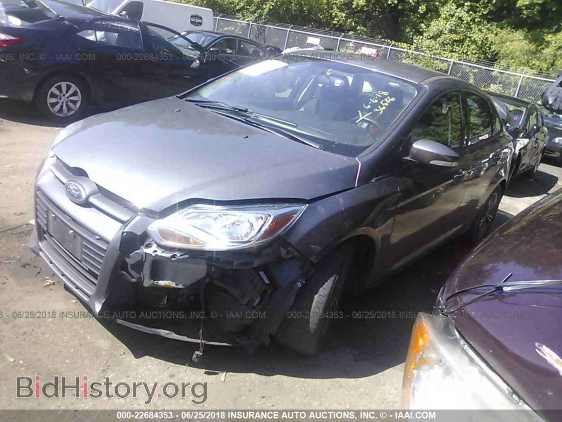 2014 Ford Focus - VIN: 1FADP3F2XEL309817 - Photo 2