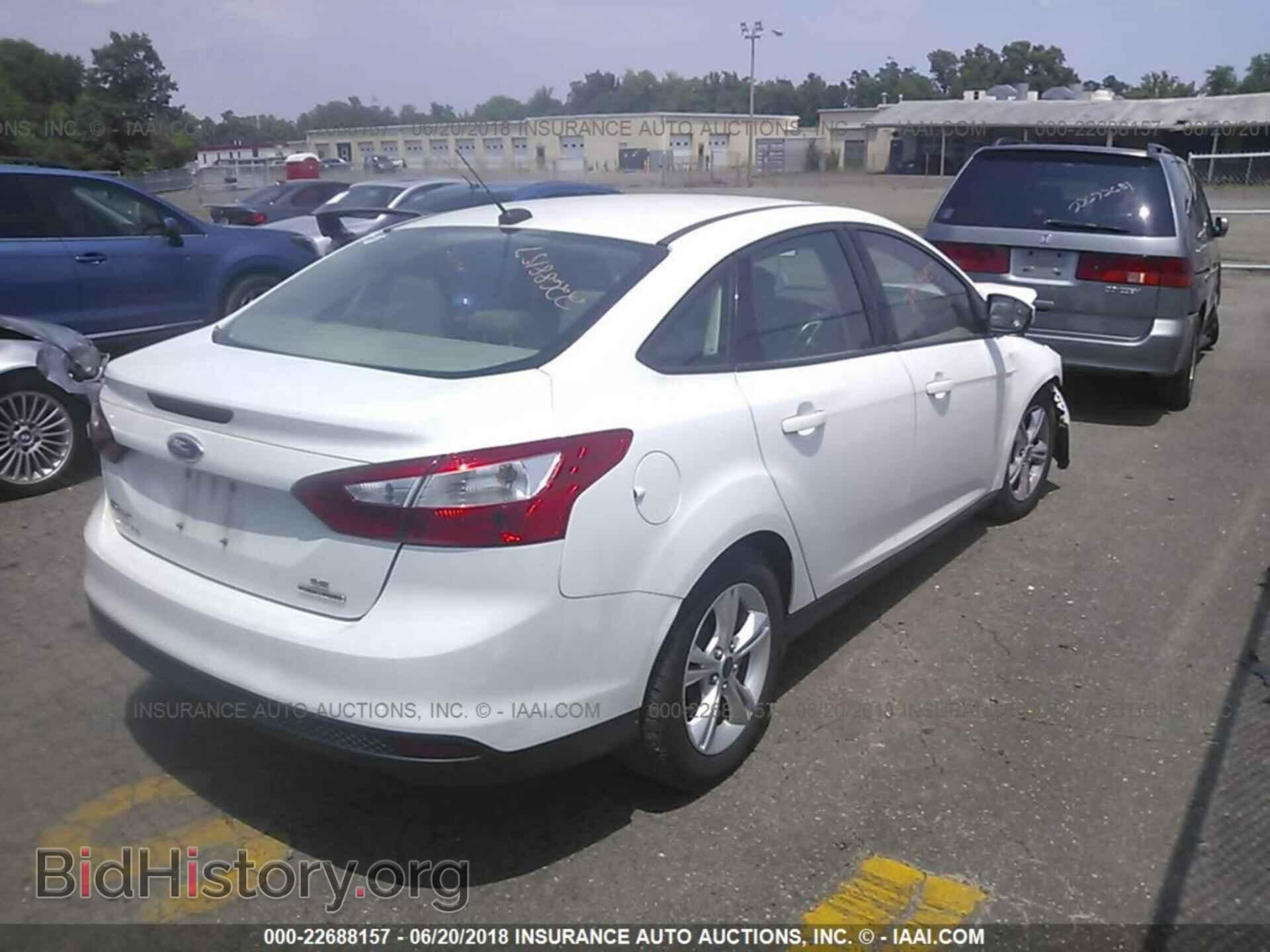 2014 Ford Focus - VIN: 1FADP3F23EL104761 - Photo 4