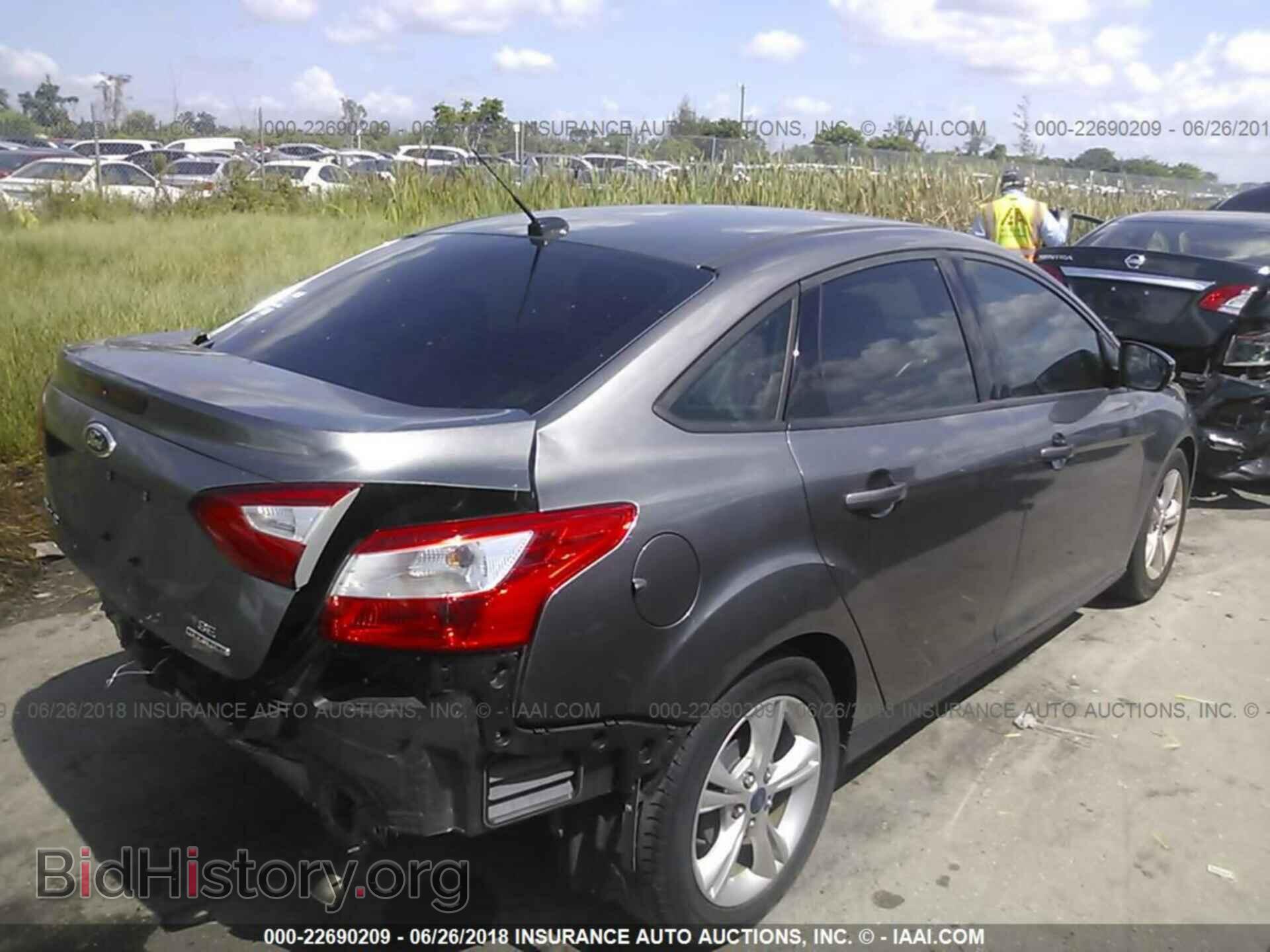 2014 Ford Focus - VIN: 1FADP3F27EL204071 - Фото 4