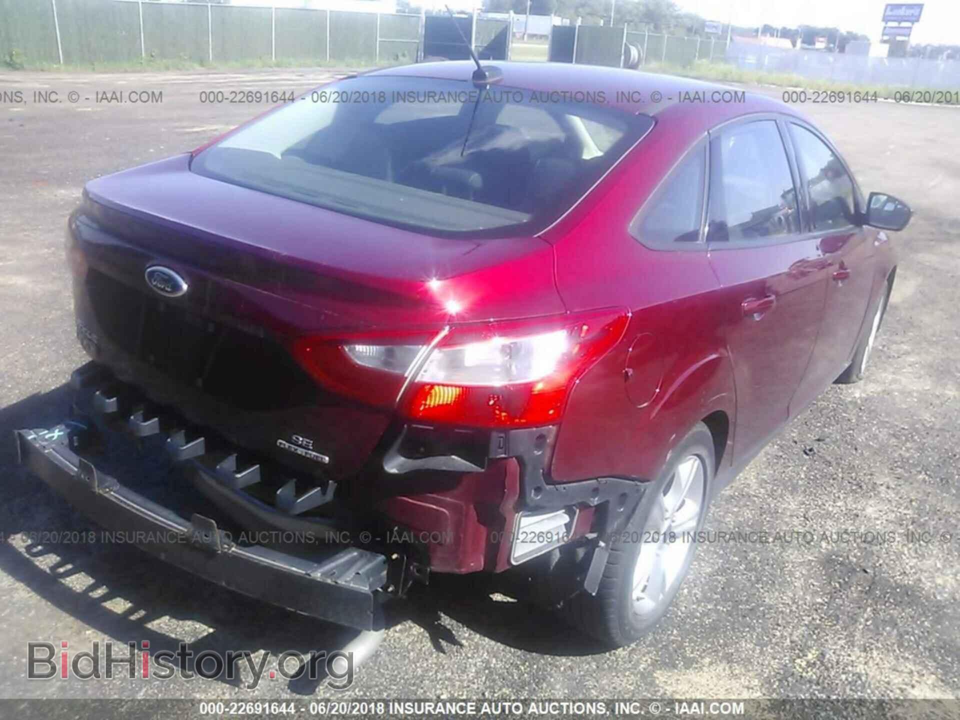 2014 Ford Focus - VIN: 1FADP3F2XEL373355 - Photo 4