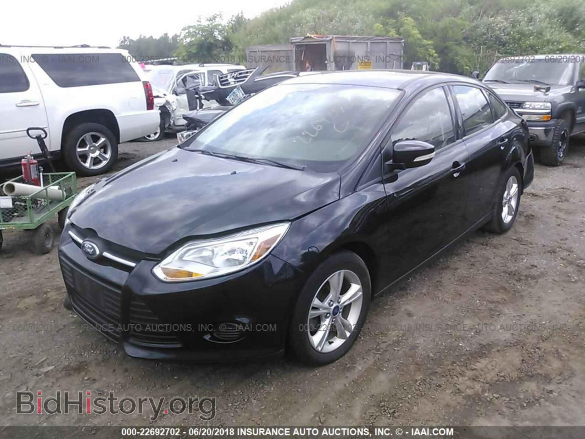 2014 Ford Focus - VIN: 1FADP3F22EL247555 - Photo 2
