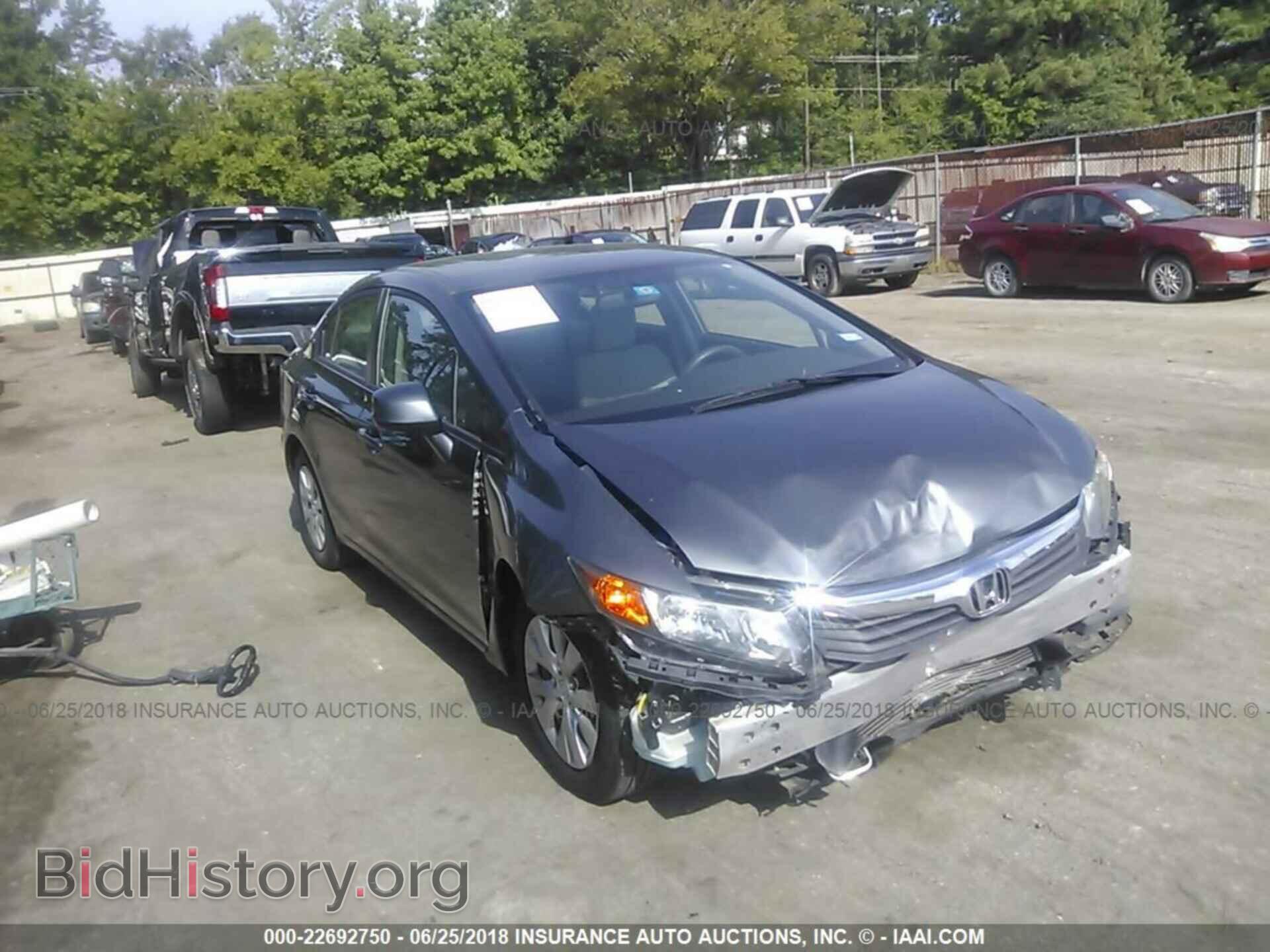2012 Honda CIVIC (VIN 19XFB2F52CE085616) — фото 1 из 10, IAAI, повреждение: передняя часть