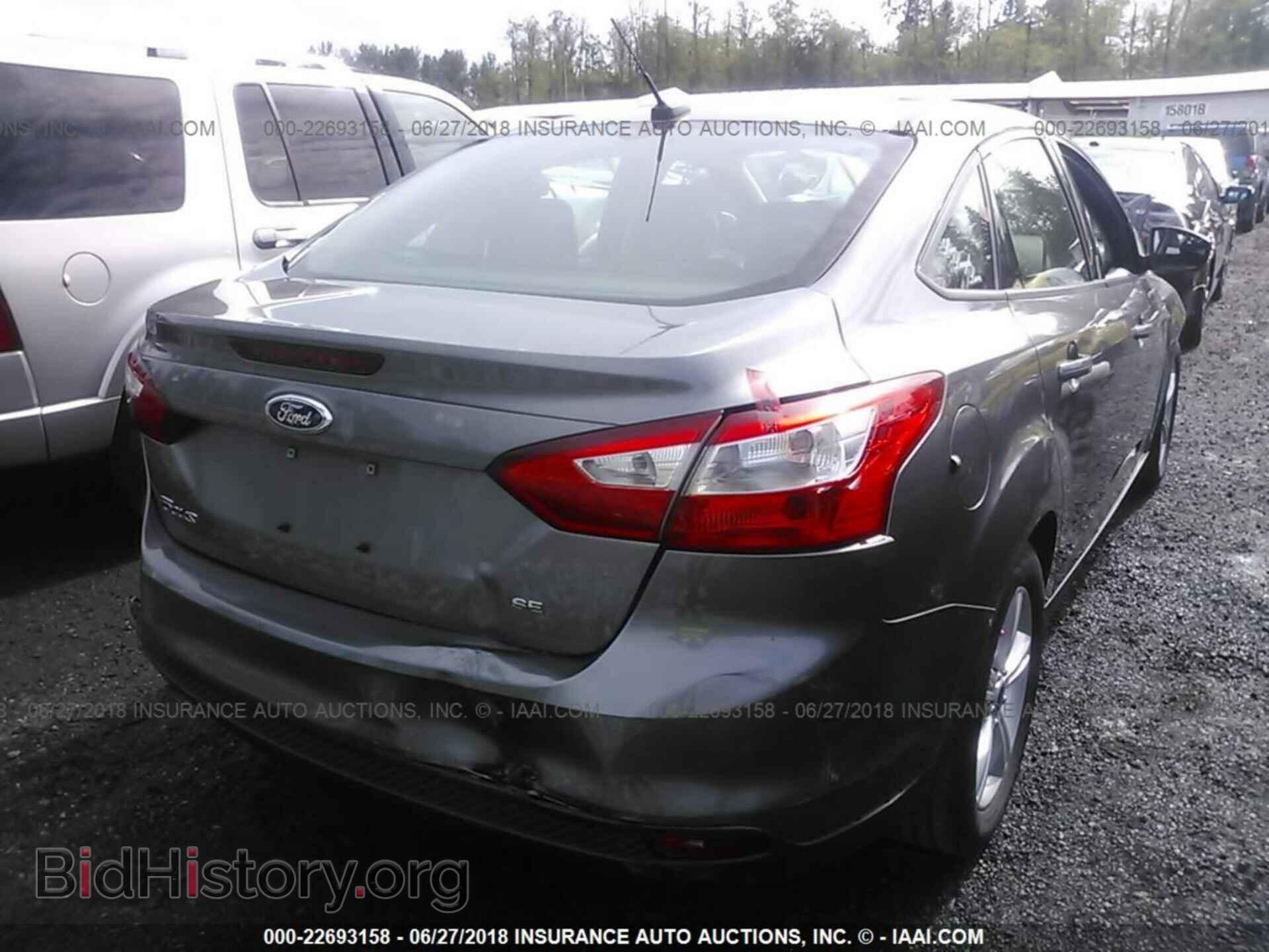 2014 Ford Focus - VIN: 1FADP3F24EL421464 - Фото 4