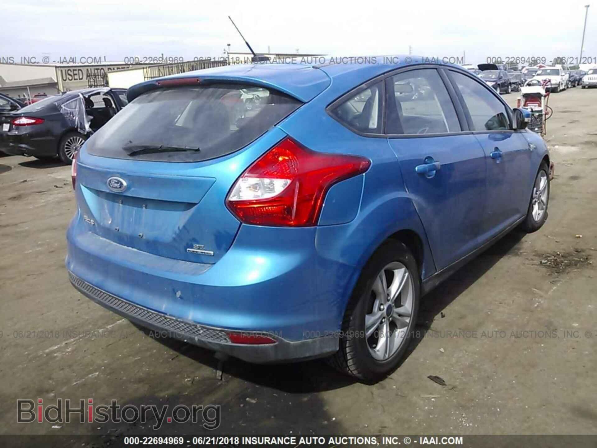 2014 Ford Focus - VIN: 1FADP3K2XEL450702 - Photo 4