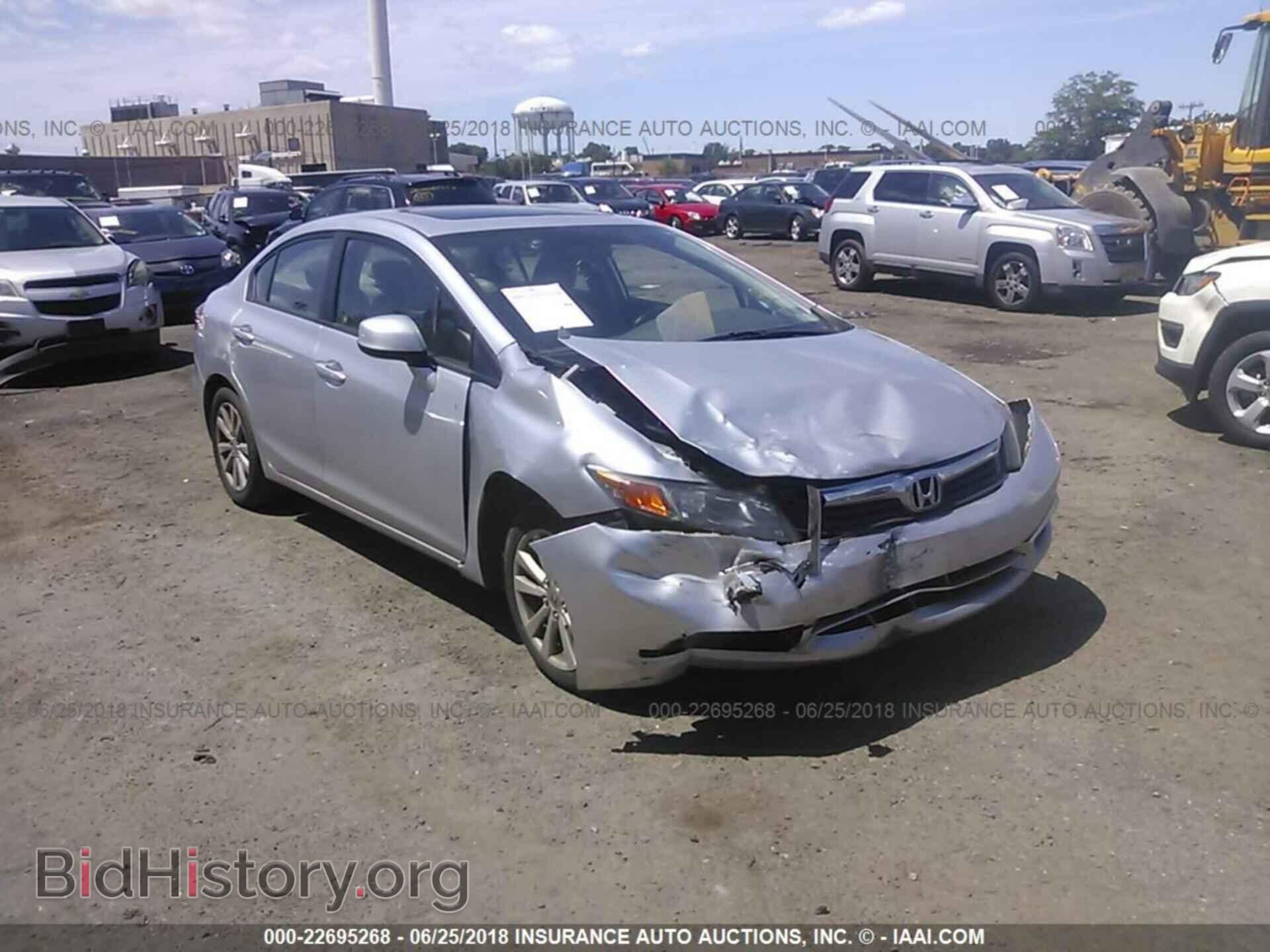 2012 Honda CIVIC (VIN 2HGFB2F81CH320734) — photo 1 of 10, IAAI, damage: front end