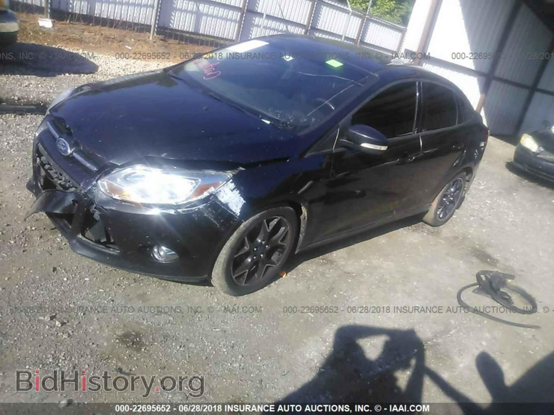 2012 Ford Focus - VIN: 1FAHP3F24CL320004 - Photo 2