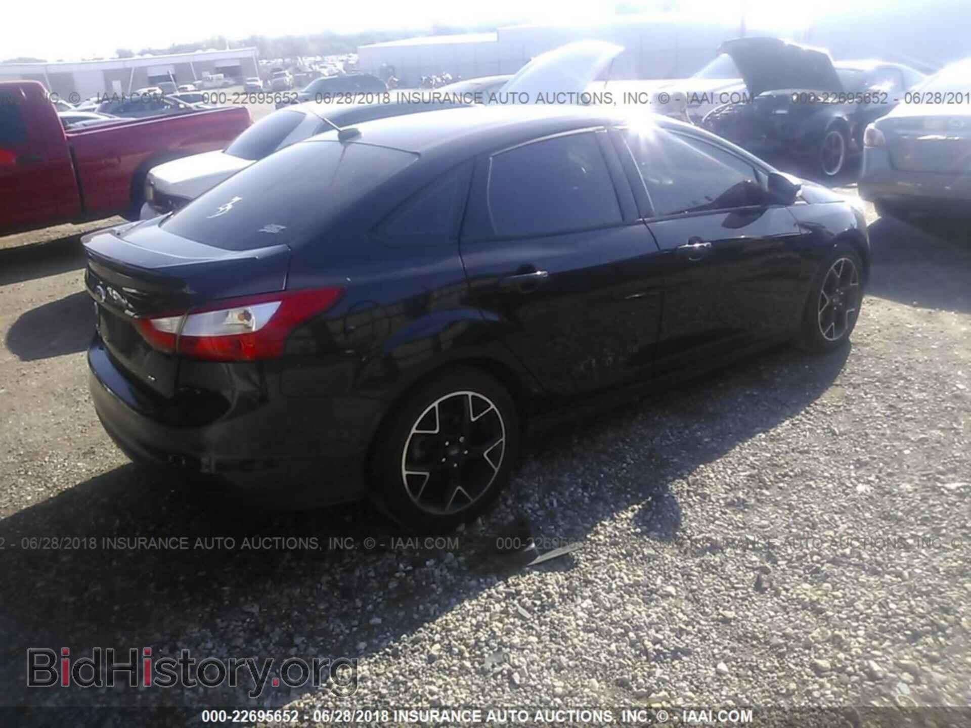 2012 Ford Focus - VIN: 1FAHP3F24CL320004 - Photo 4