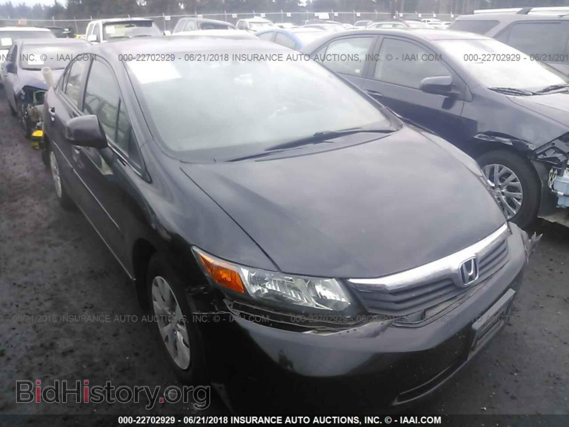 2012 Honda CIVIC (VIN JHMFB2F5XCS000470) — photo 1 of 10, IAAI, damage: front & rear