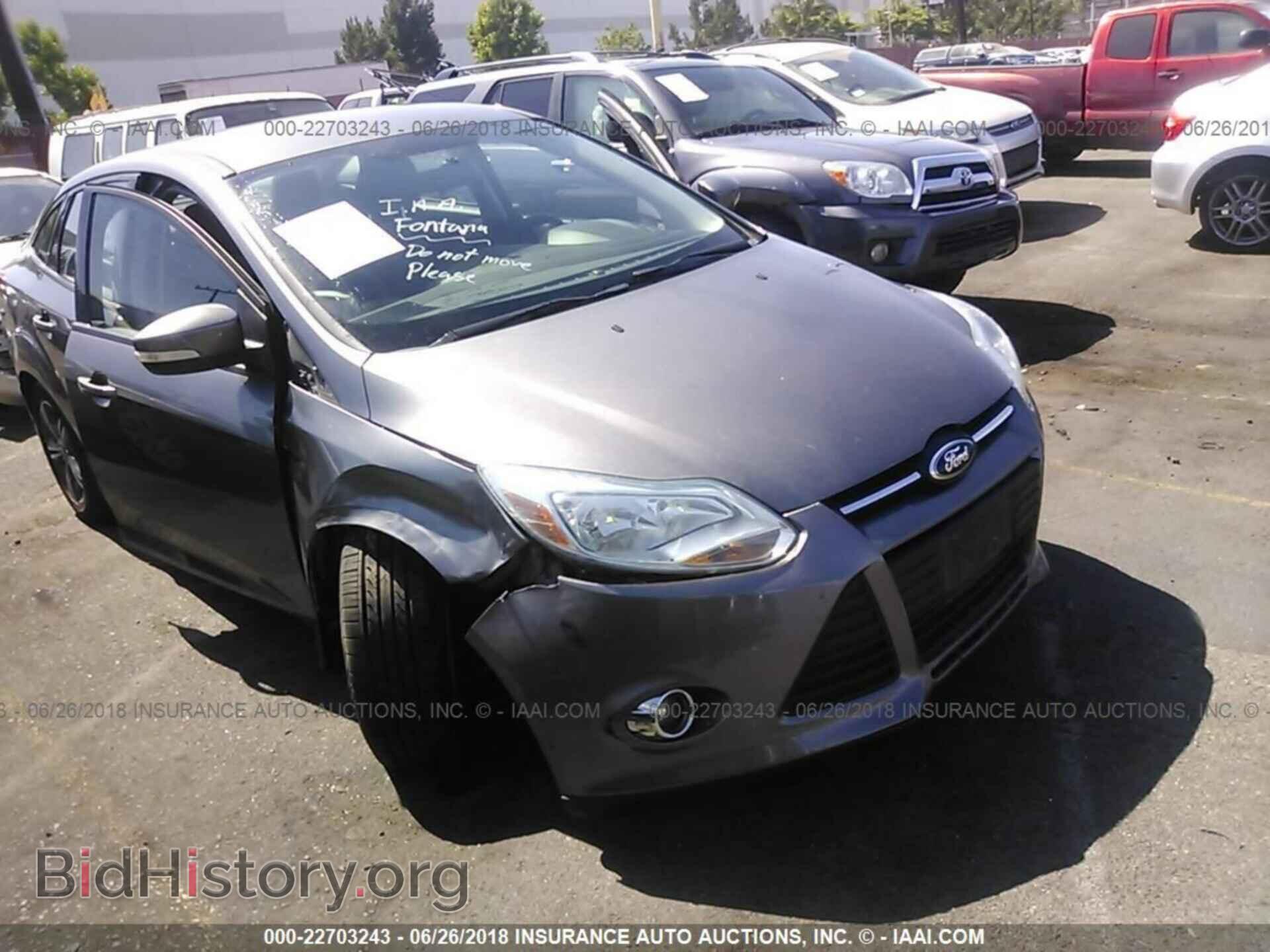 Фотография 1FADP3F21EL199160 - Ford Focus 2014