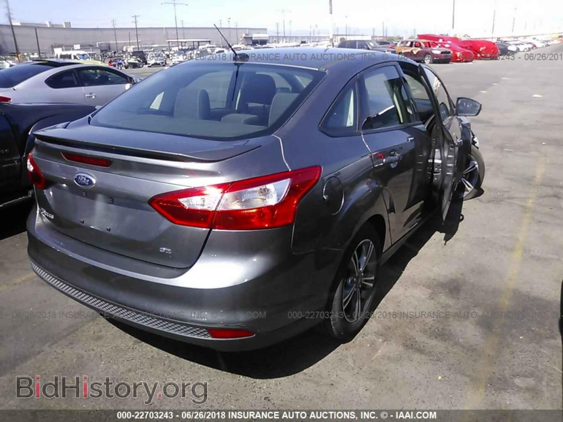 2014 Ford Focus - VIN: 1FADP3F21EL199160 - Photo 4